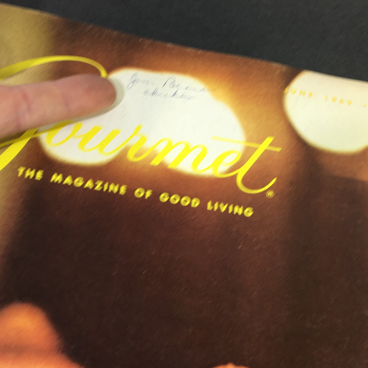 Cover of VTG Gourmet The Magazine of Good Living June 1969 featuring the handwritten date and title embellished with a warm, vintage background.