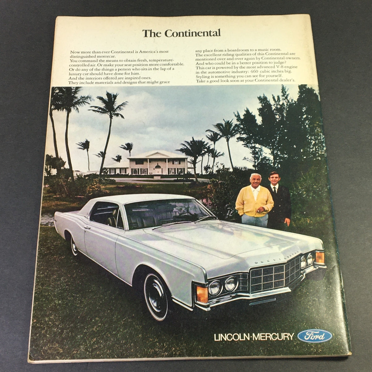 Back cover of VTG Gourmet The Magazine of Good Living June 1969 showcasing the Lincoln Continental car advertisement set in a tropical landscape with two men in formal attire.