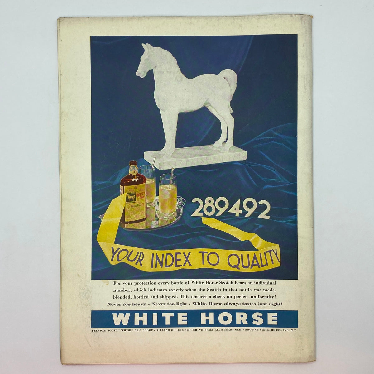 Advertisement in The New Yorker Complete Magazine March 11, 1939 for White Horse Scotch whiskey, featuring a striking visual of a white horse statue and branding elements.