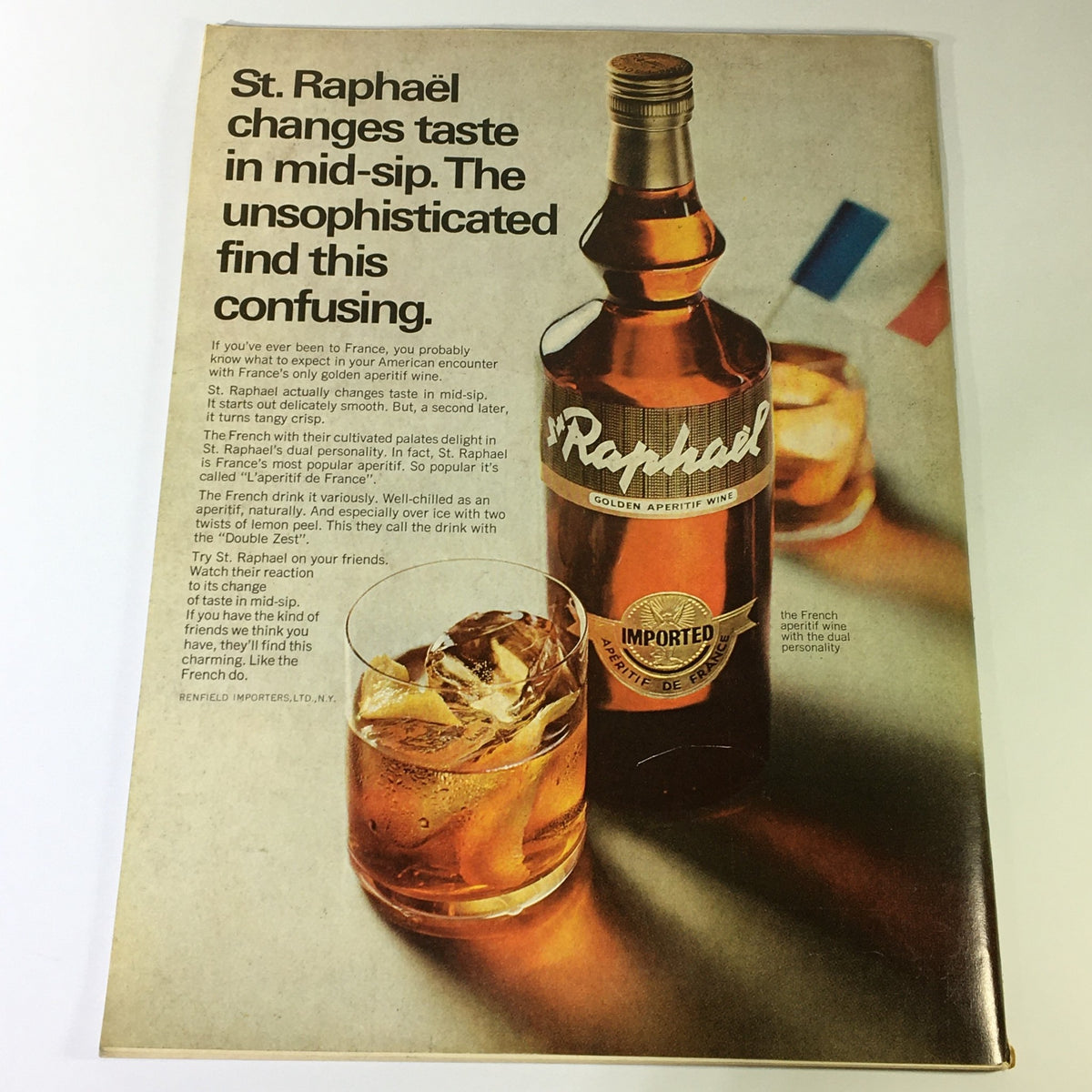 Back cover of VTG Gourmet The Magazine of Good Living April 1967, showcasing an advertisement for St. Raphaël golden aperitif wine with a drink and ice.
