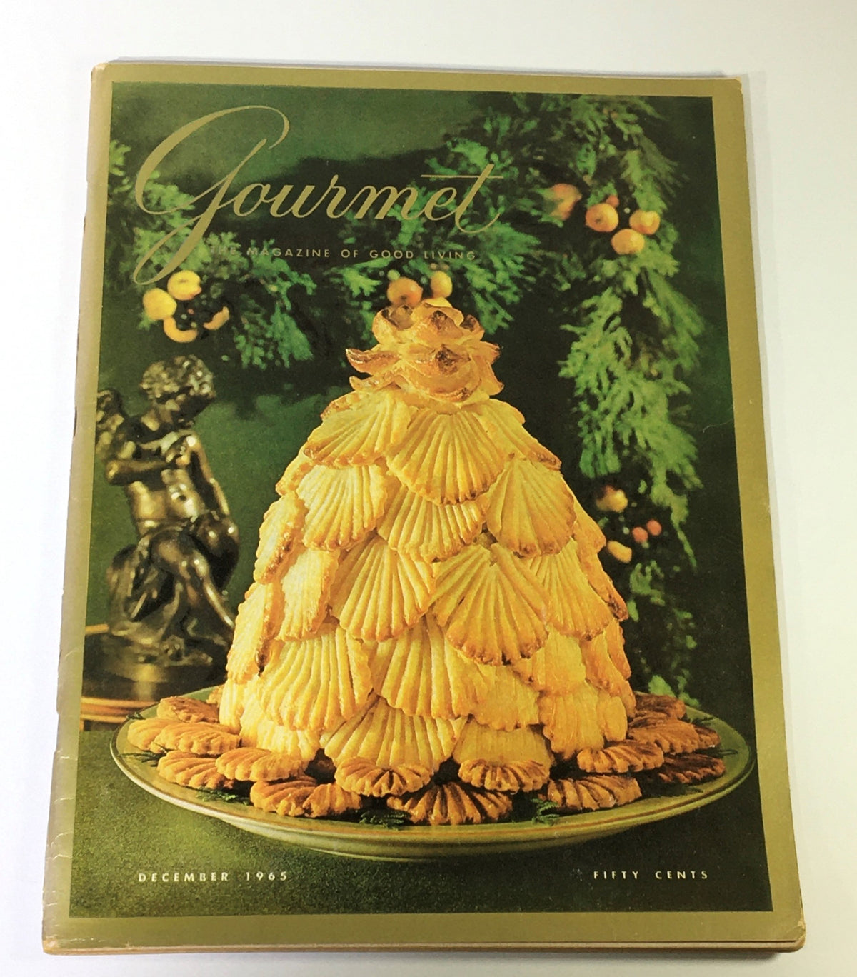 Cover of Gourmet The Magazine of Good Living, December 1965, featuring an elaborate dessert resembling a Christmas tree, symbolizing 1960s gourmet culture.