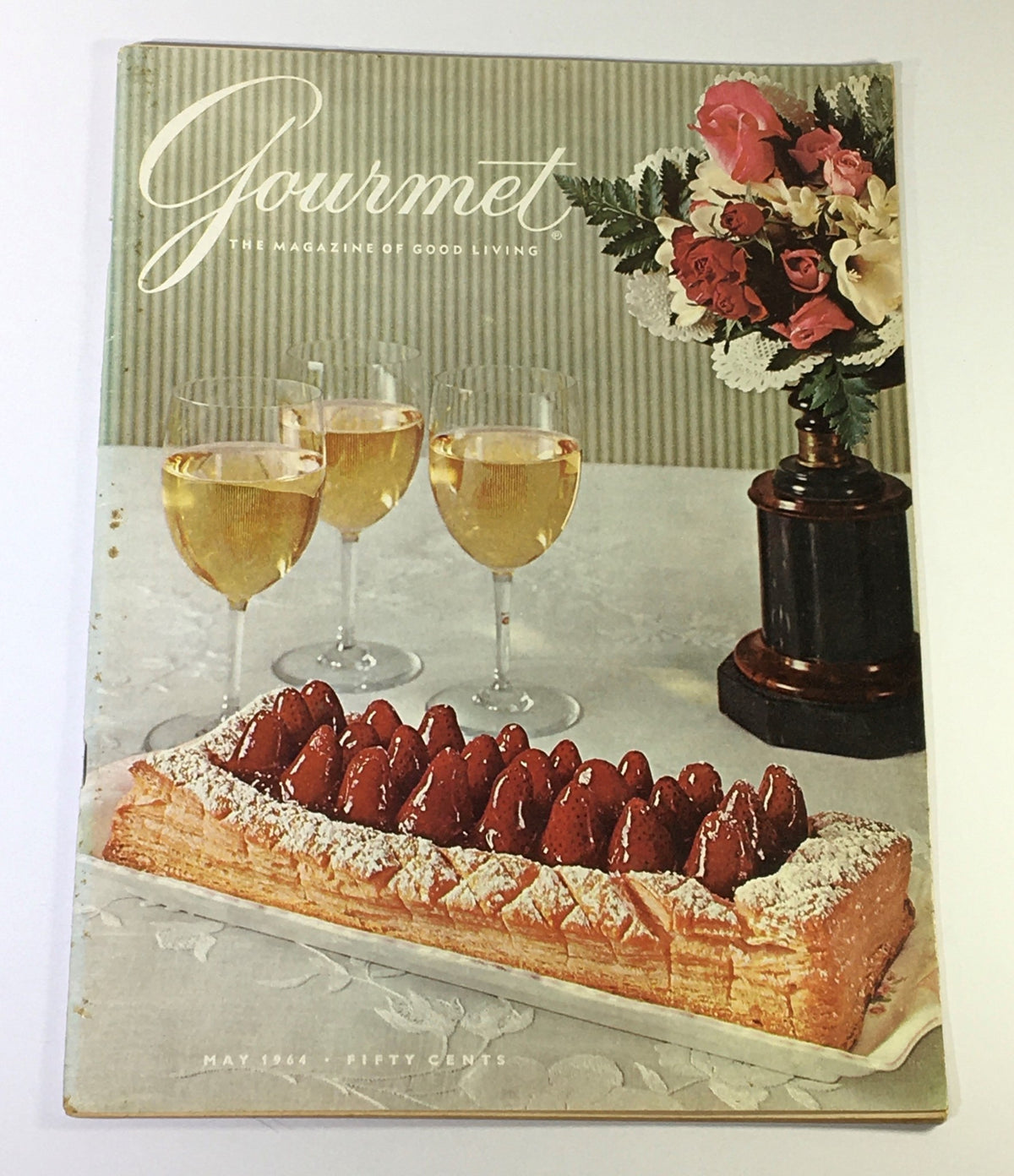 Cover of VTG Gourmet: The Magazine of Good Living, May 1964, featuring an elegant dessert and wine setting, showcasing culinary artistry and vintage dining aesthetics.