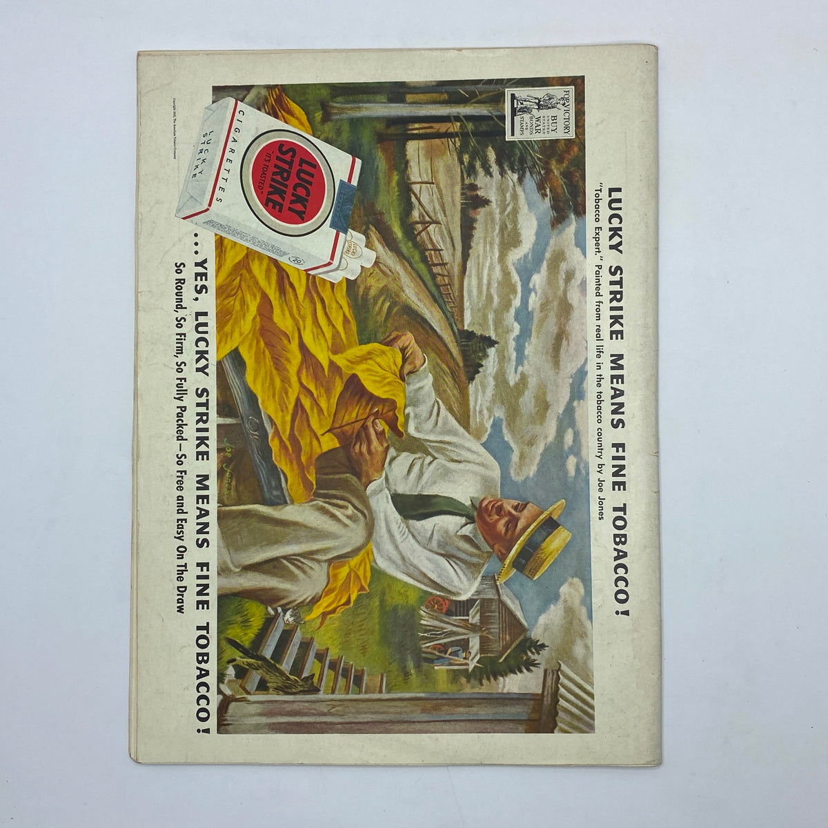 Vintage advertisement for Lucky Strike cigarettes from The New Yorker magazine August 7, 1943, illustrating a man relaxing outdoors while advertising the product's quality. A classic representation of 1940s advertising.