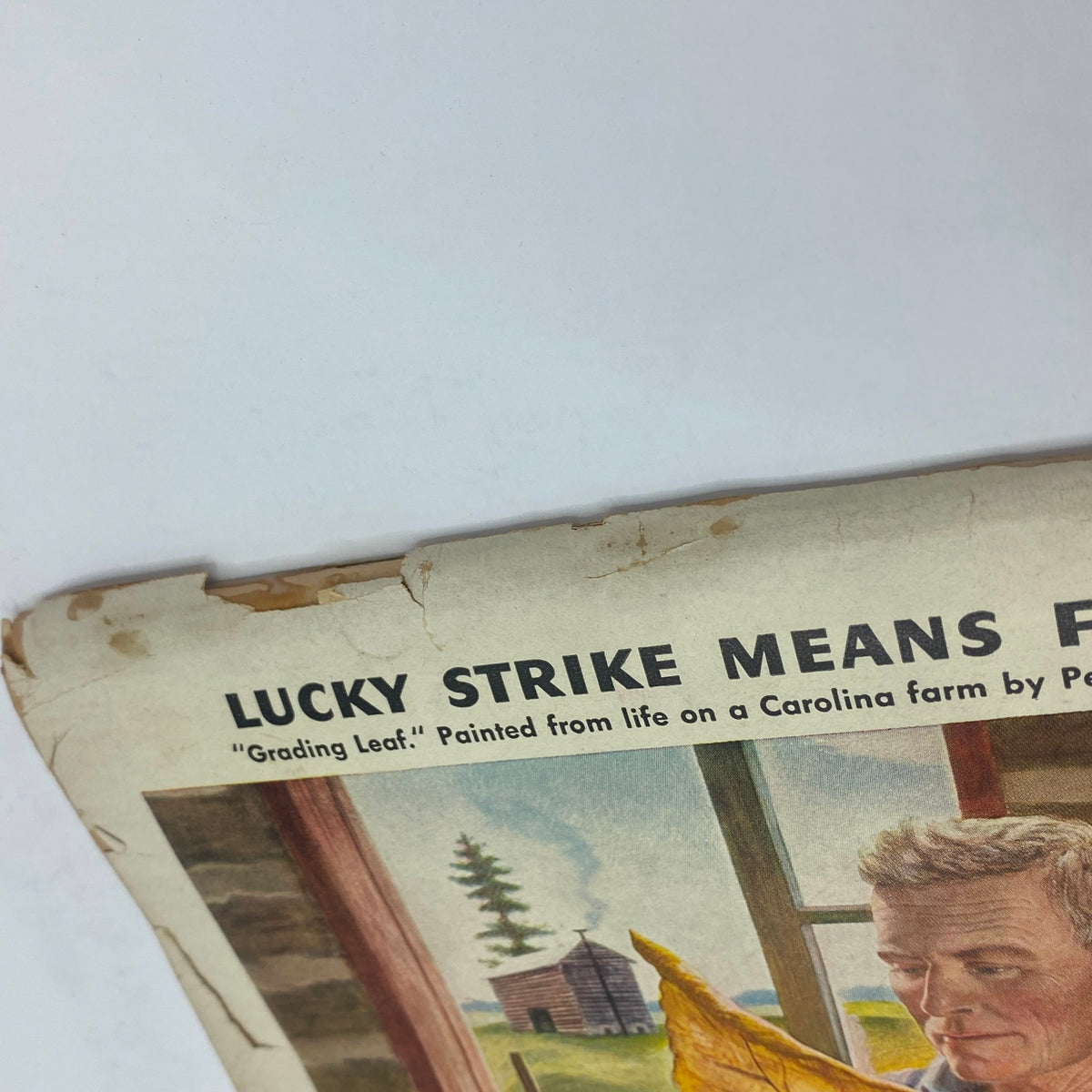 Detail of the Lucky Strike advertisement from The New Yorker Complete Magazine October 9, 1943, highlighting the grading of tobacco leaves with a historical context.