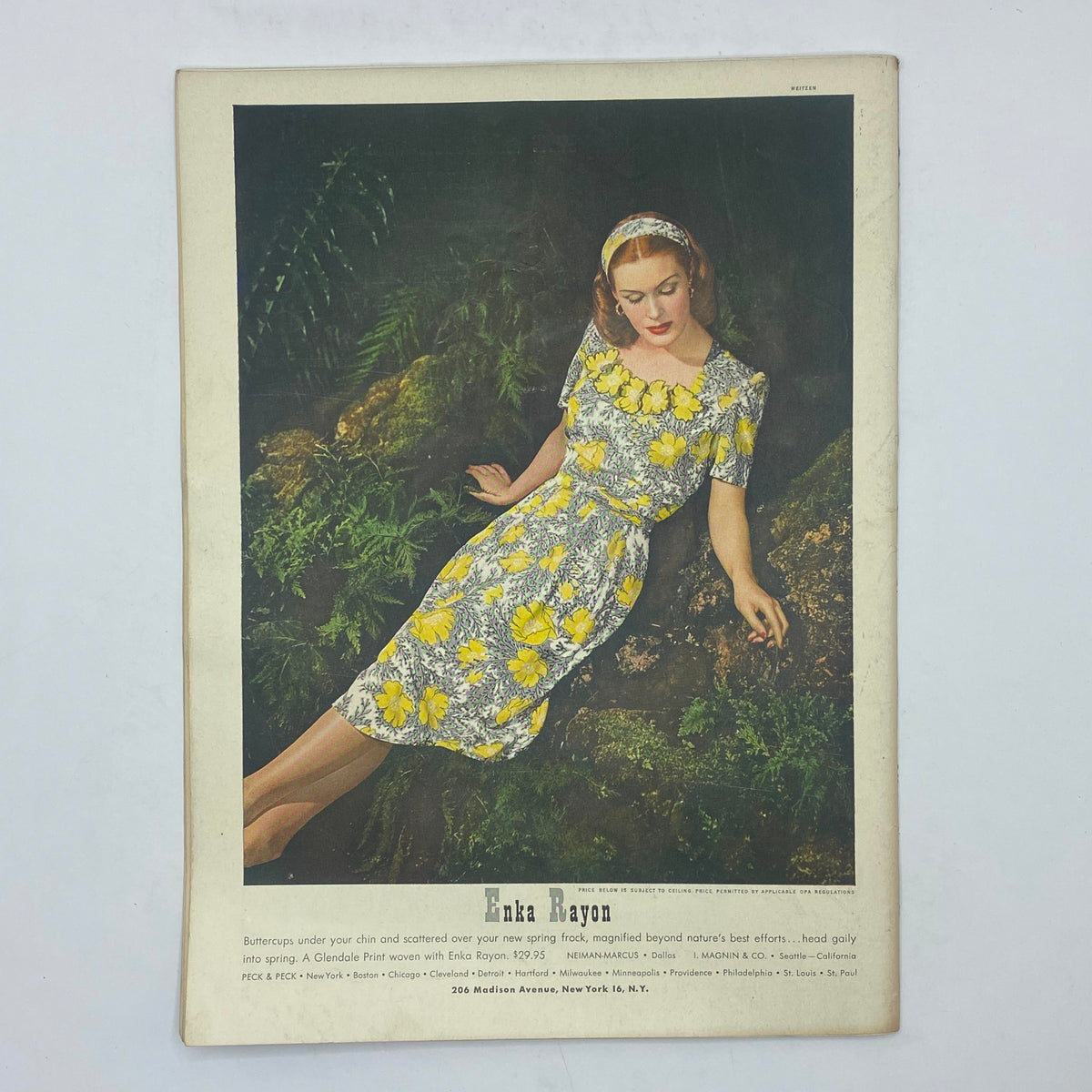 Vintage advertisement showcasing a woman wearing a floral dress made of Enka Rayon, from The New Yorker magazine dated February 5, 1944.