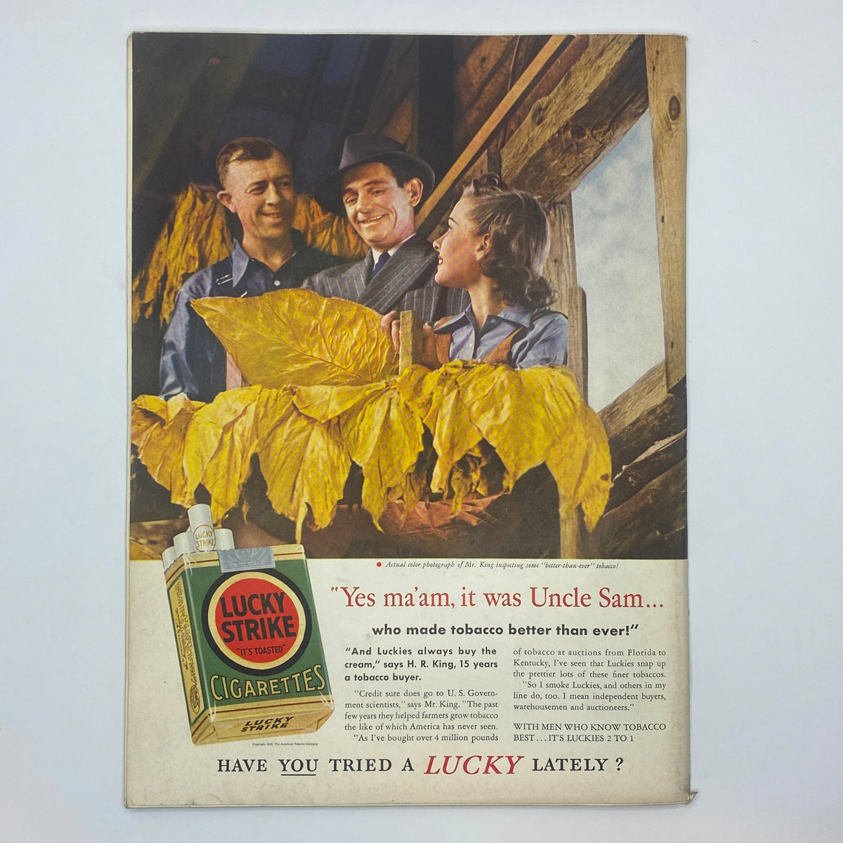 Back cover of The New Yorker Complete Magazine May 18, 1940 depicting a vintage advertisement for Lucky Strike cigarettes with a colorful illustration of people in a tobacco field.