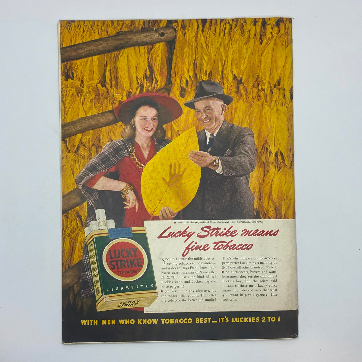 Vintage advertisement from The New Yorker magazine, November 1, 1941, promoting Lucky Strike cigarettes with a colorful depiction of two people holding tobacco leaves.