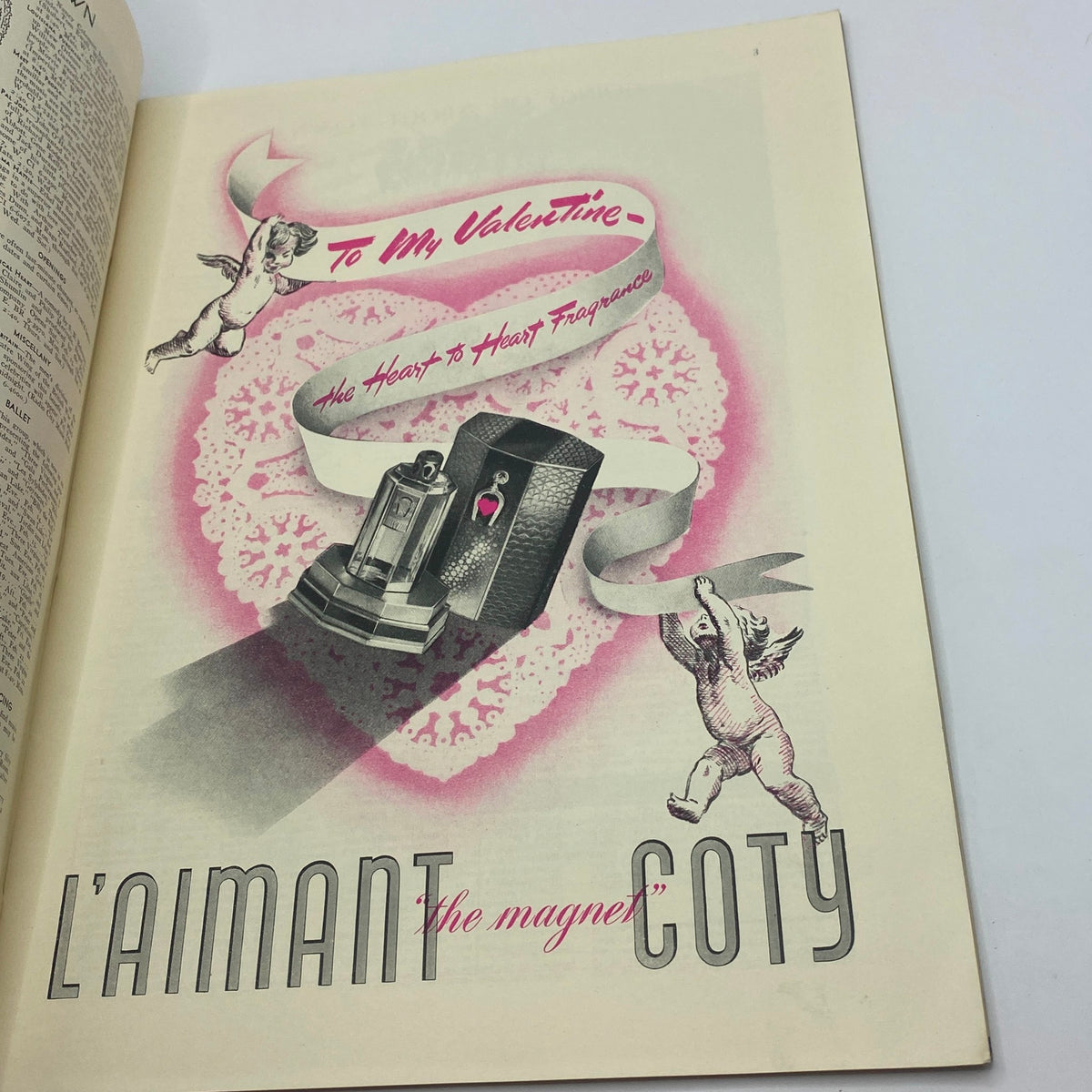 Advertisement from The New Yorker Complete Magazine February 15, 1941 for L'Aimant Coty perfume, featuring a festive design with cherubs and a Valentine theme.