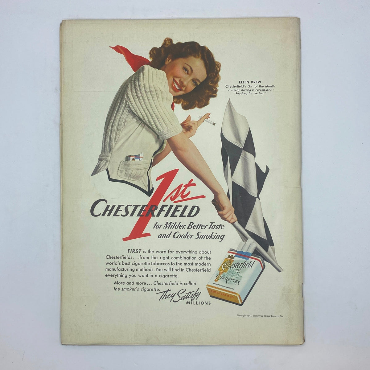 Advertisement page from The New Yorker magazine, April 26, 1941, featuring Chesterfield cigarettes with a smiling woman promoting its milder taste, emphasizing mid-20th century advertising style.