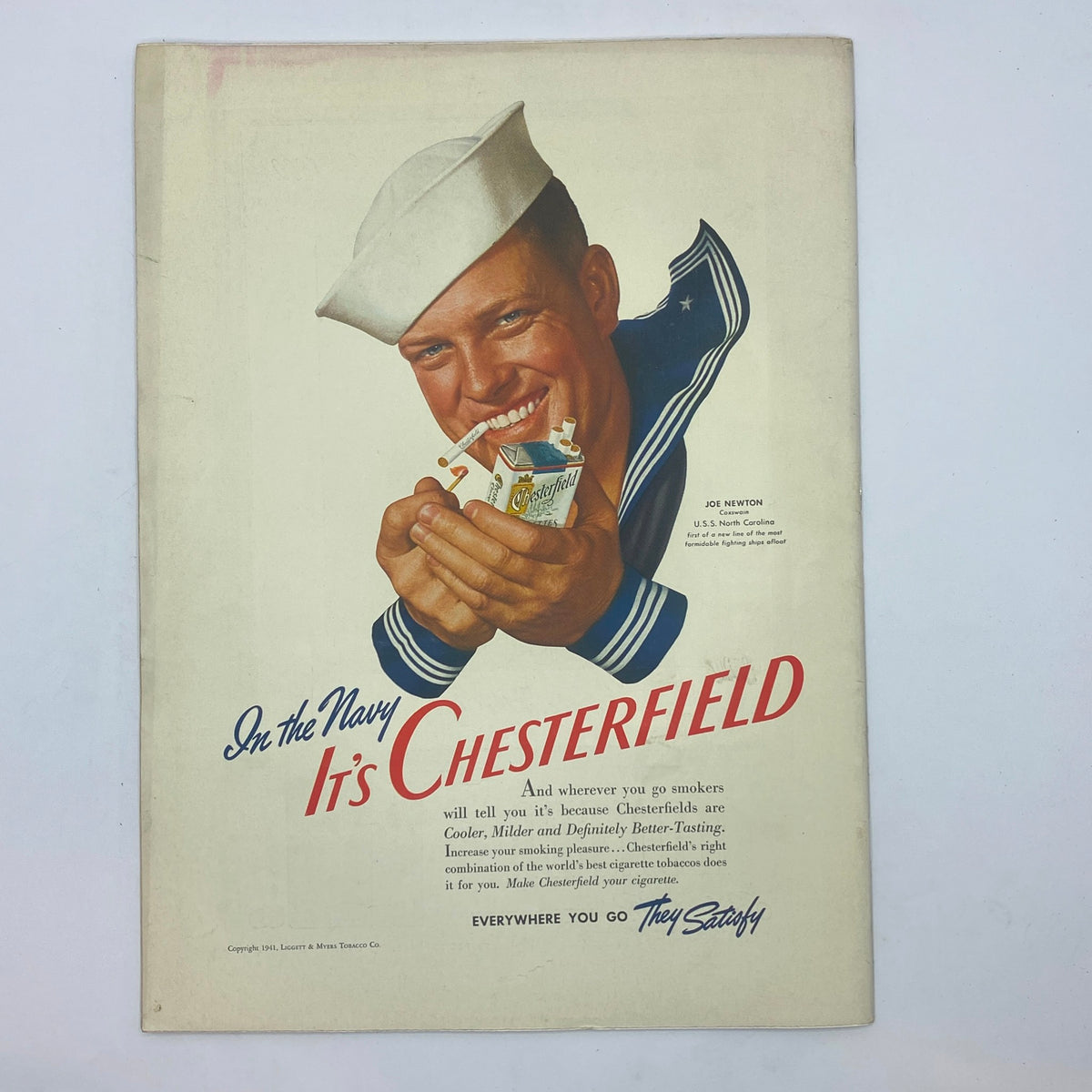 Vintage advertisement from The New Yorker Complete Magazine July 26, 1941 featuring a sailor promoting Chesterfield cigarettes with a cheerful expression.