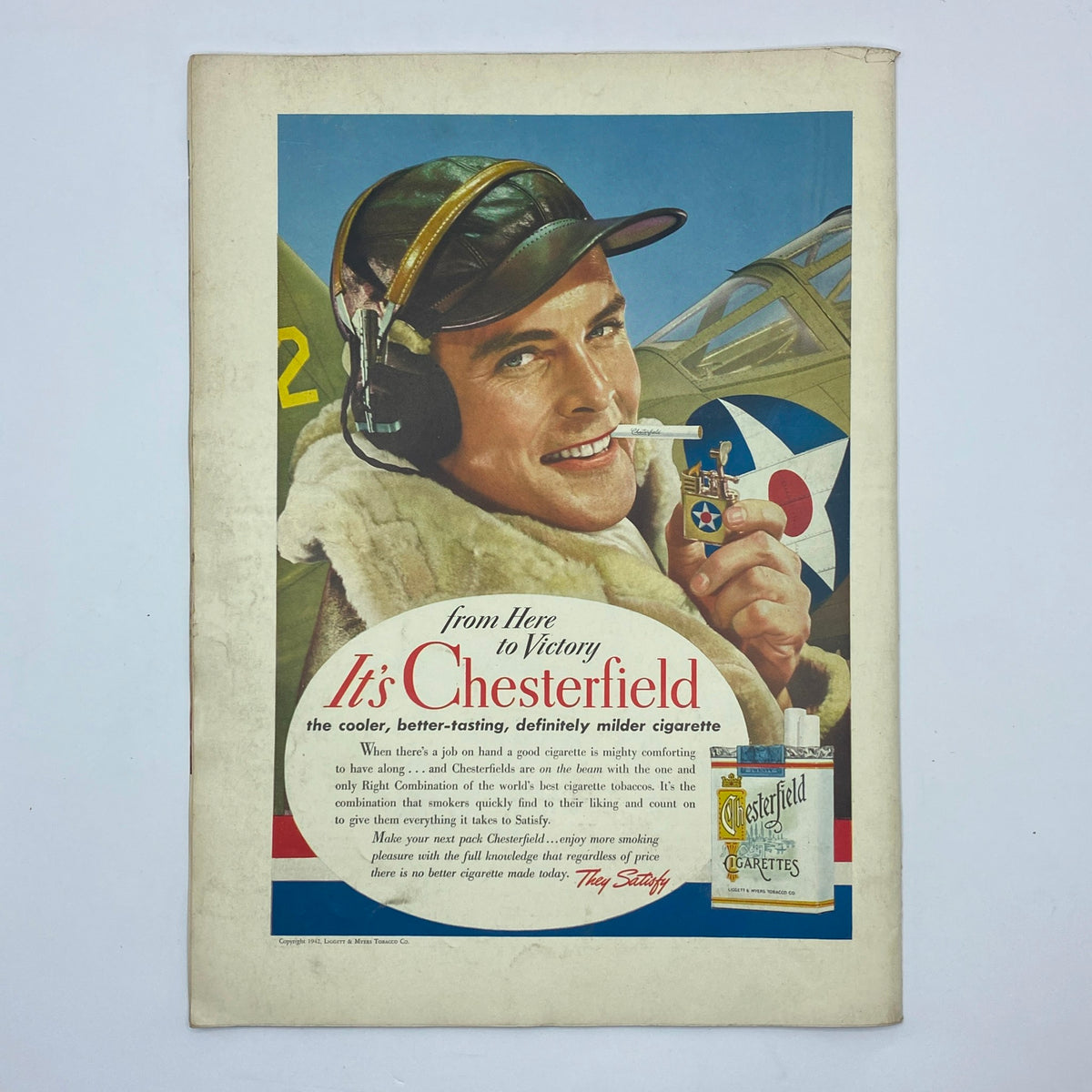 Advertisement from The New Yorker magazine September 5, 1942 promoting Chesterfield cigarettes with an illustration of a military pilot.