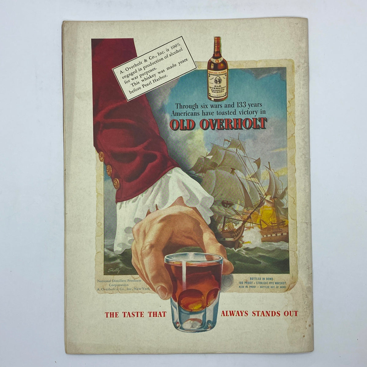Vintage advertisement featuring Old Overholt whiskey with an artistic portrayal of a hand holding a glass. The ad includes historical context with a caption stating, 'Through six wars and 133 years Americans have toasted victory in OLD OVERHOL.' The New Yorker Complete Magazine April 3, 1943 Peter Arno Cover.