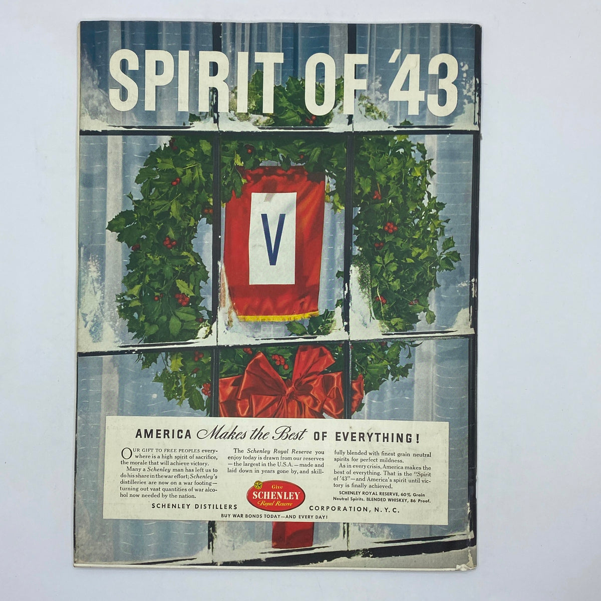 The New Yorker Complete Magazine December 5, 1942 Constantin Alajalov Cover - An advertisement titled 'Spirit of '43' with a holiday wreath design and a festive bow, promoting Schenley distillers.
