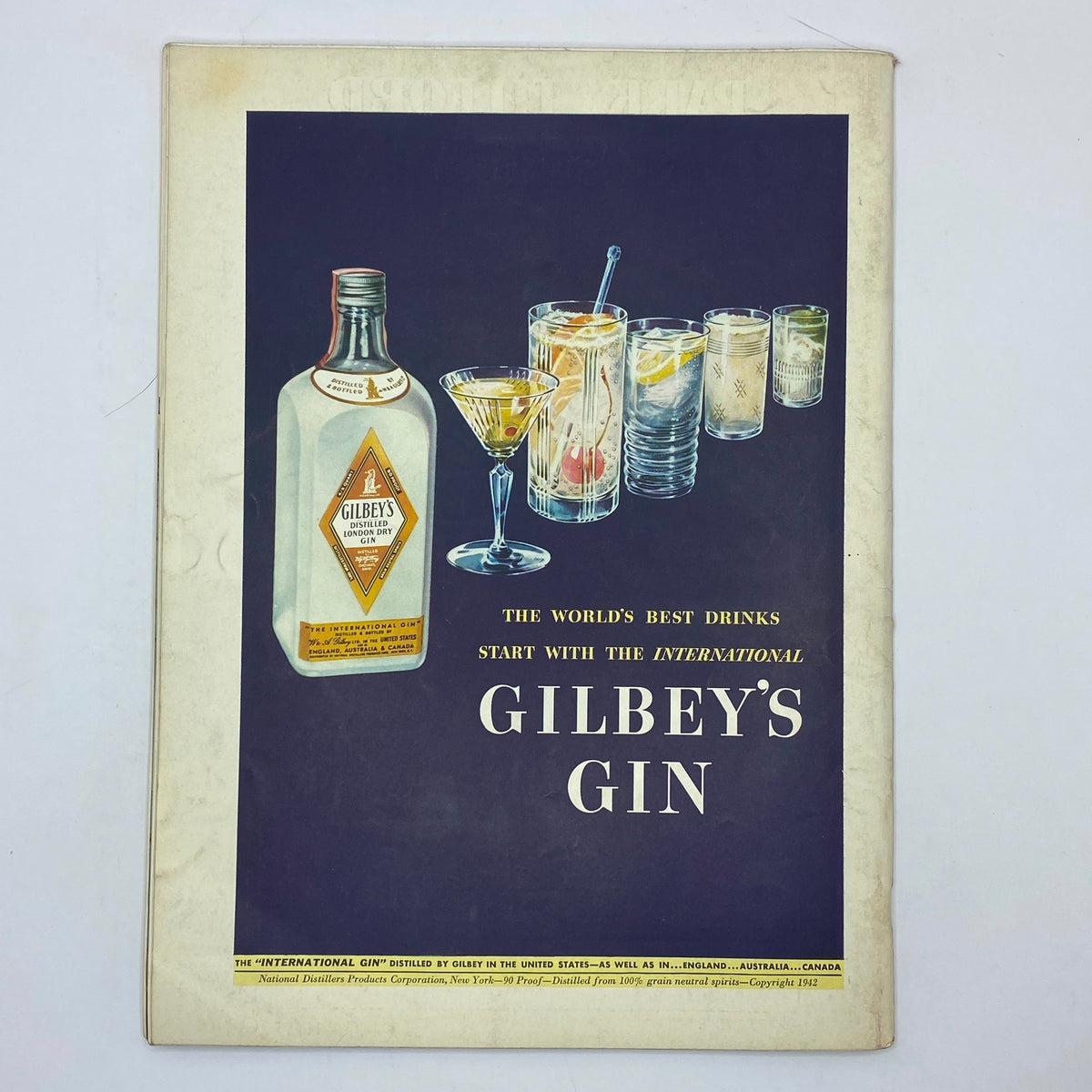 Promotional page from The New Yorker magazine dated December 12, 1942, advertising Gilbey's Gin with illustrations of drinks and cocktails, highlighting its branding as 'the world's best drinks'.
