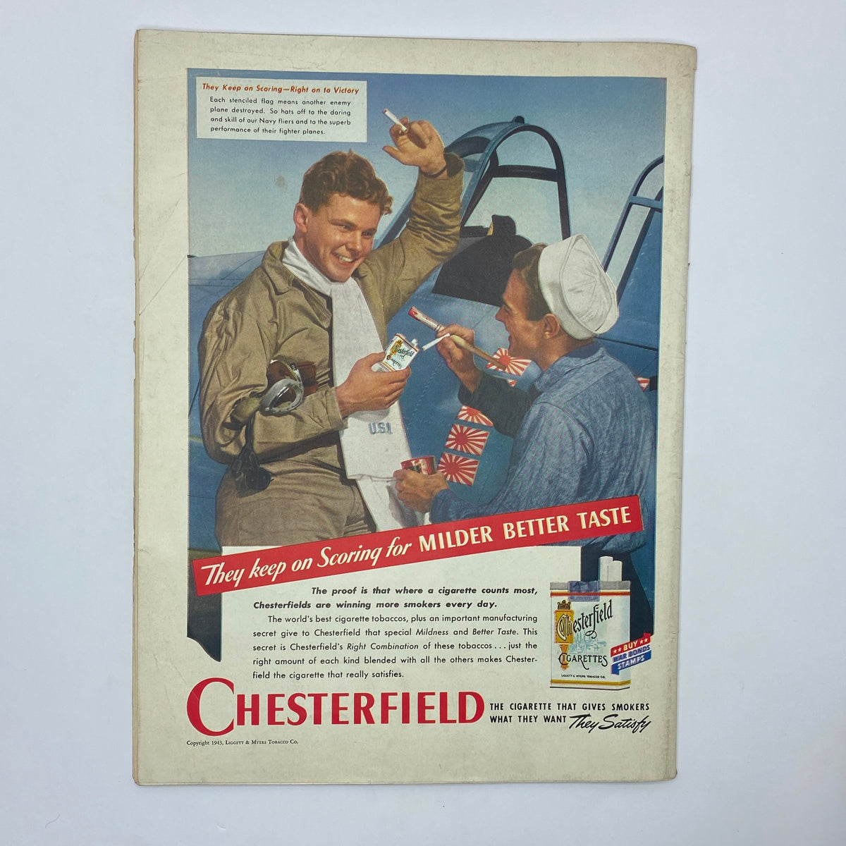 Advertisement for Chesterfield cigarettes from The New Yorker magazine dated June 26, 1943 showing two men in military uniforms discussing cigarettes near an aircraft. Title: The New Yorker Complete Magazine June 26, 1943 Rea Irvin Cover VG.