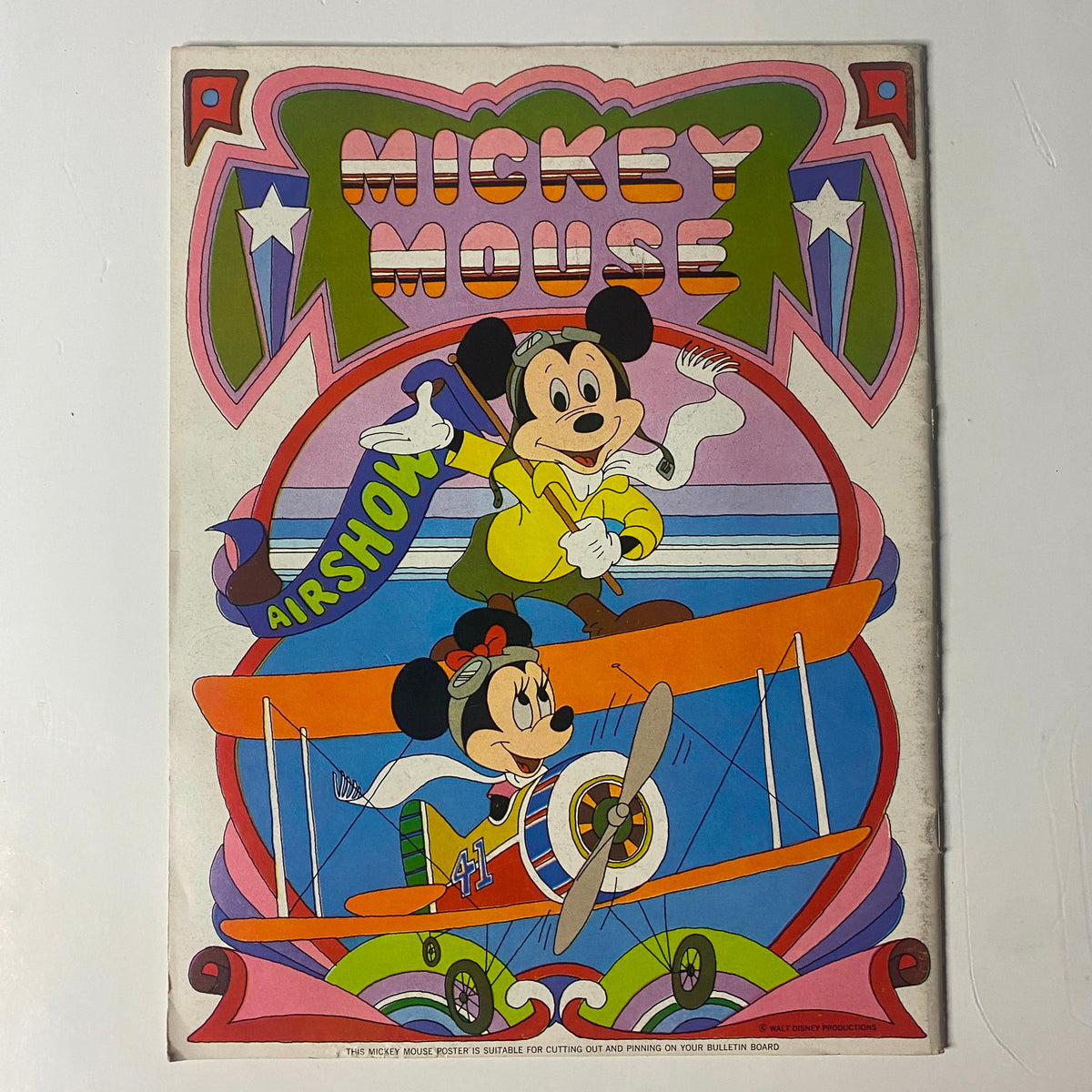 Cover of a vintage Mickey Mouse magazine featuring Mickey and Minnie Mouse in an airshow theme, showcasing classic Disney illustrations.