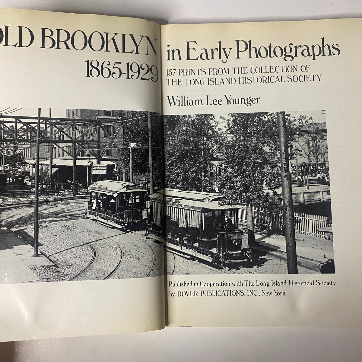 Interior view of 'Old Brooklyn in Early Photographs 1865-1929' by William Lee Younger, featuring vintage photographs and text from the Long Island Historical Society.