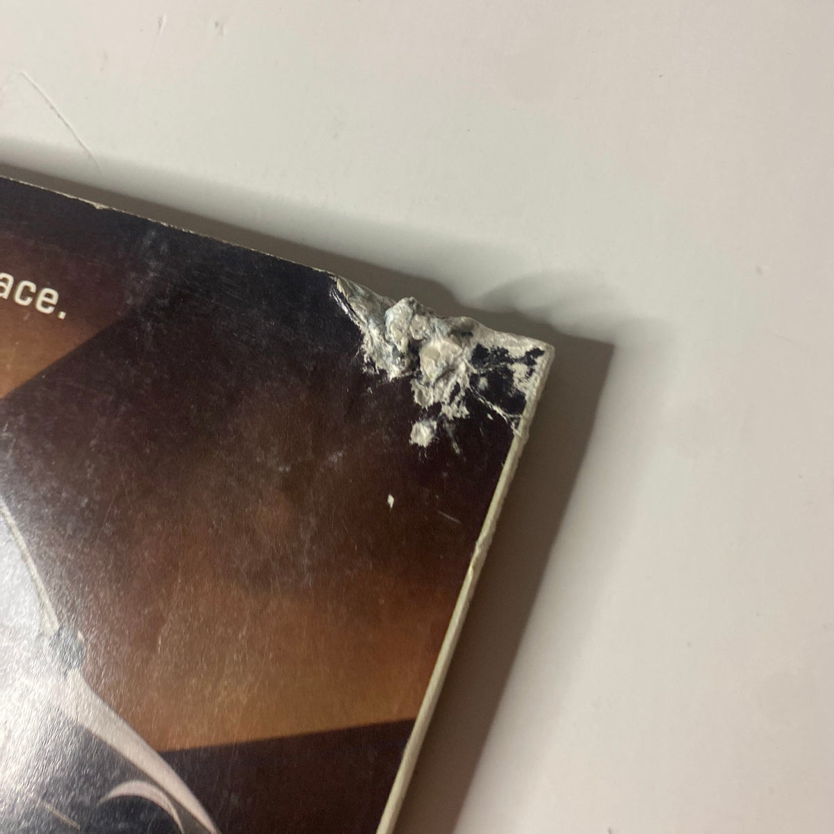 Close-up of wear on the back cover of Martha Stewart Living Magazine February 1997, showing damage at the corner.