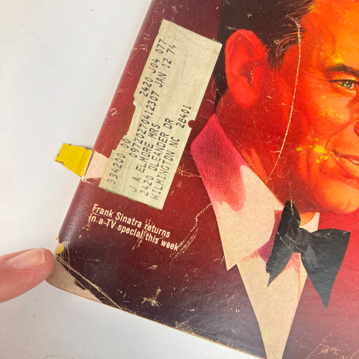 Close-up of the cover of TV Guide Magazine November 17 1973 issue #1077, highlighting the text 'Frank Sinatra returns in a TV special this week' along with a vintage magazine label.