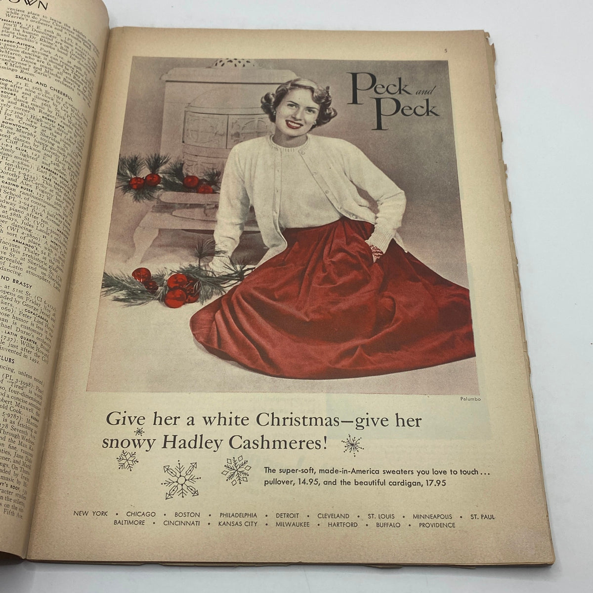 Vintage advertisement page with a woman in a red skirt sitting by a fireplace, promoting Hadley Cashmeres, from The New Yorker Complete Magazine November 29, 1947.