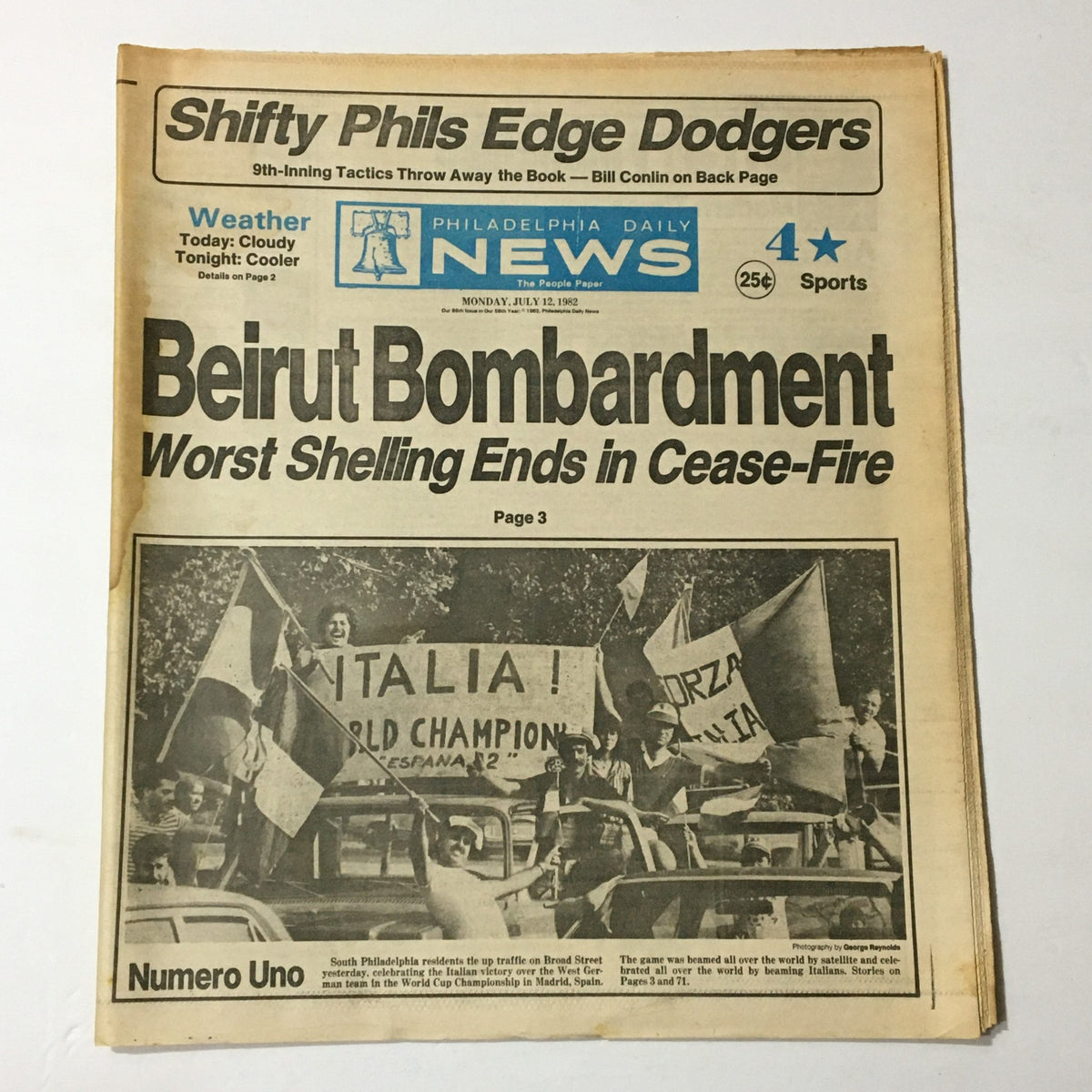 Vintage Philadelphia Daily News July 12, 1982, highlighting the end of the Beirut bombardment with a cease-fire announcement. The front page features a graphic design with banners and images related to the conflict.