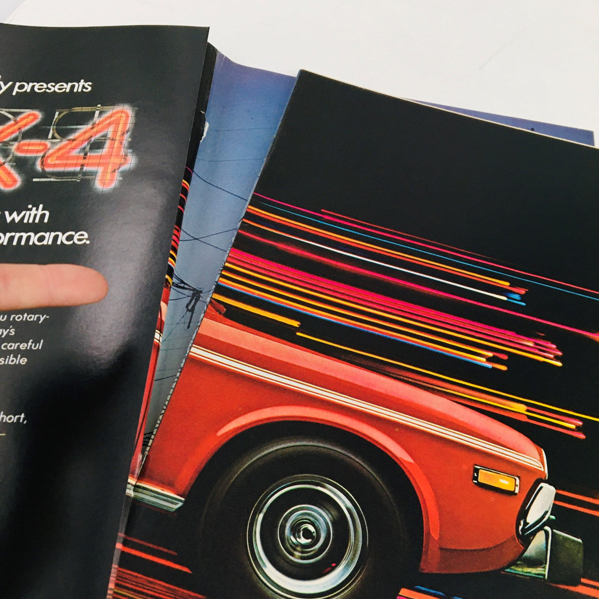 Inside view of Newsweek Magazine from February 4, 1974 showcasing vintage advertisements, reflecting the design and style trends of that era.