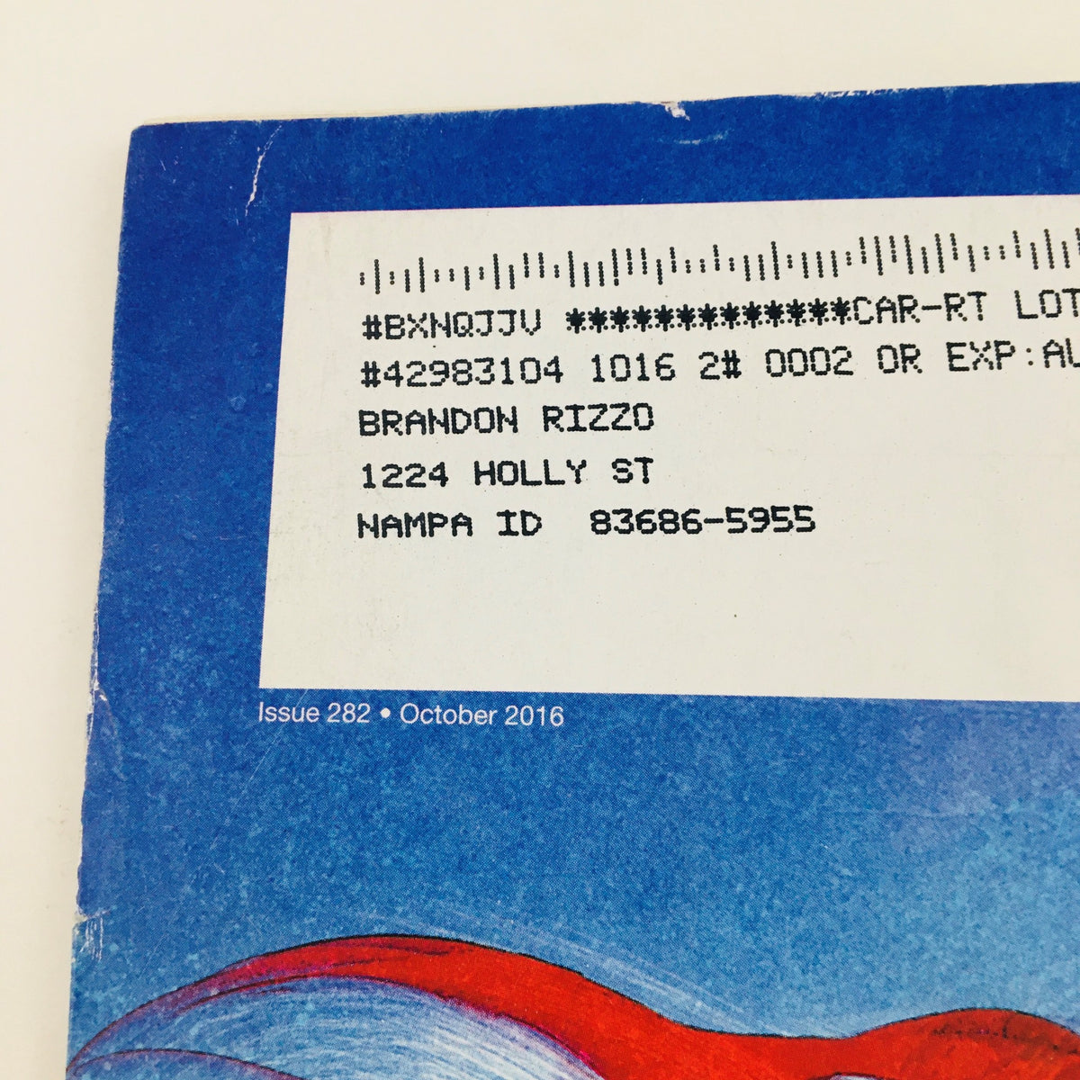 Address and details on back cover of Game Informer Magazine October 2016 Issue #282, featuring promotional art related to Horizon Zero Dawn, adding to its uniqueness as a collectible.