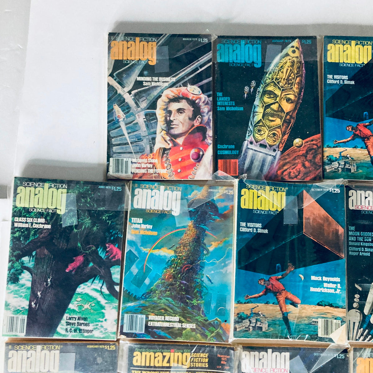VTG Analog Science Fiction and Fact Magazine Lot of 19 1970s - Close-up of magazine covers showcasing imaginative art and notable stories from the 1970s.