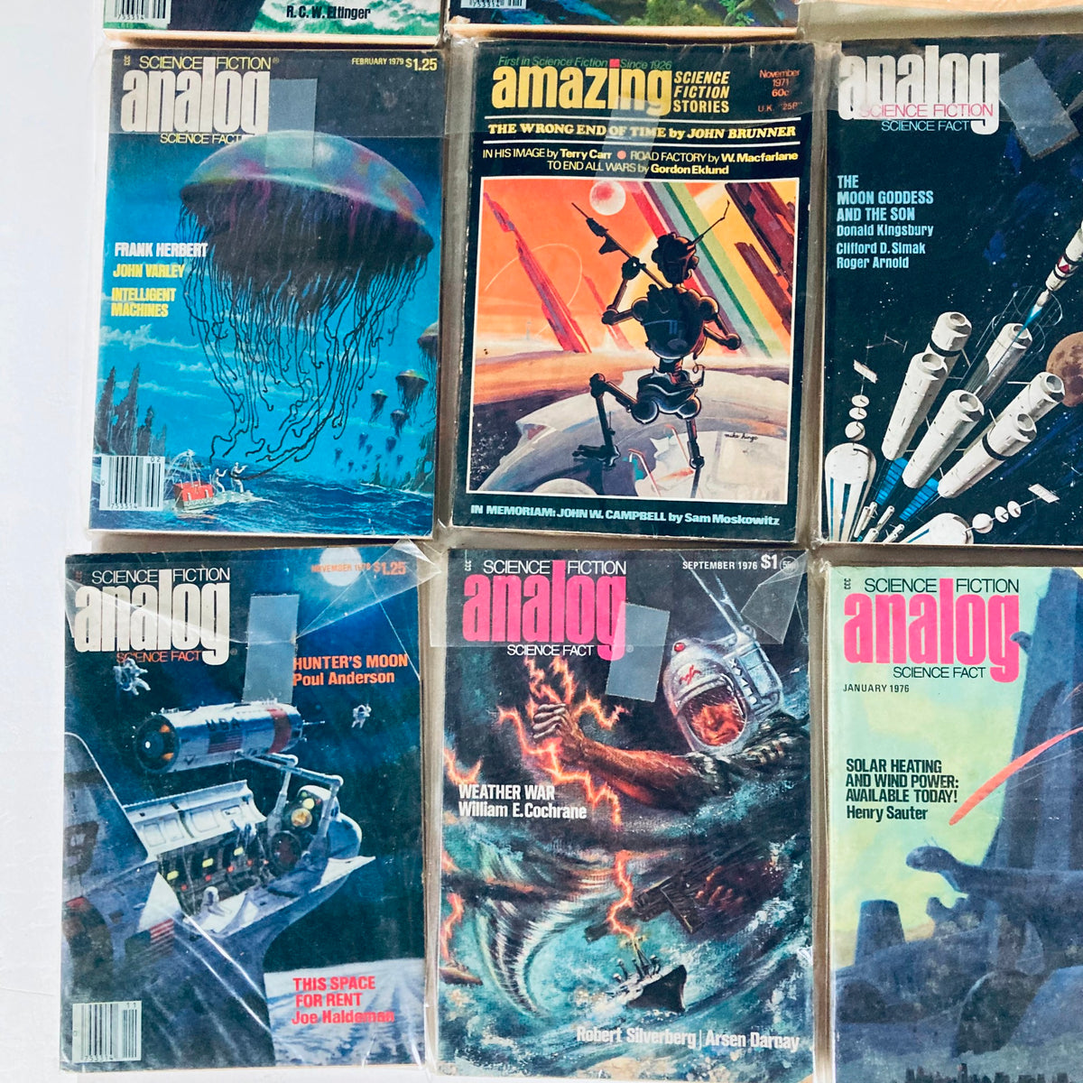 VTG Analog Science Fiction and Fact Magazine Lot of 19 1970s featuring various iconic covers including vibrant colors and sci-fi themes, showcasing classic stories from February 1979, November 1976, and others.