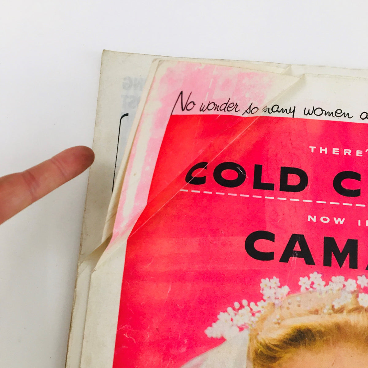 Back cover of the Woman's Home Companion August 1954 magazine, revealing vintage advertisements and a handwritten comment highlighting the magazine's historical context.