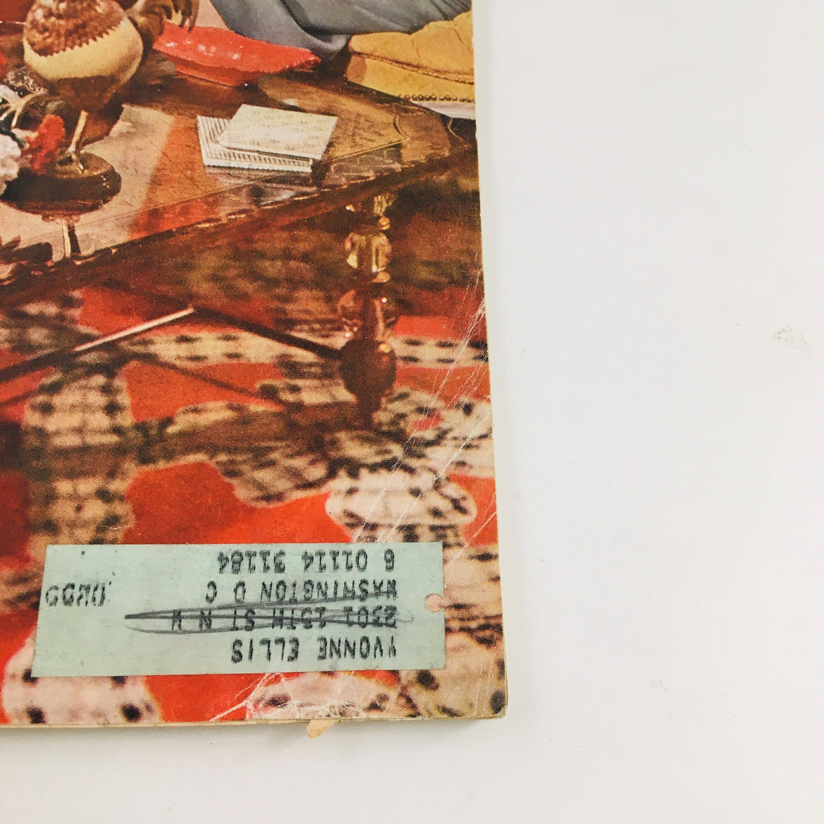 Back cover of Woman's Home Companion October 1954, presenting details of the magazine including a label and the publication date.
