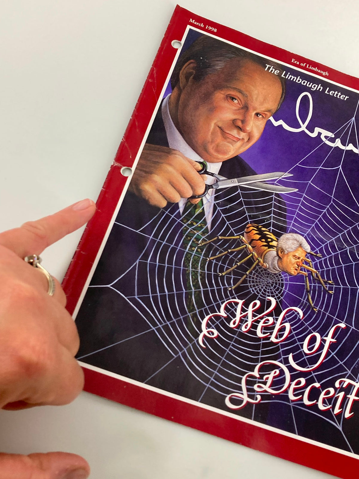 Cover of the Rush Limbaugh Letter Newsletter Magazine from March 1998 titled 'Web of Deceit', featuring an illustration of Rush Limbaugh with scissors and a spider web, highlighting political commentary of the late 1990s.
