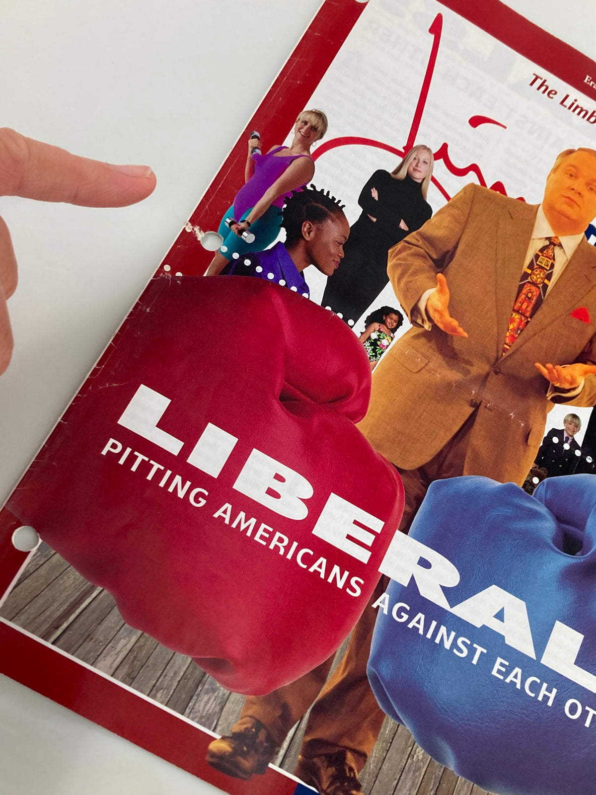 Close-up view of the Rush Limbaugh Letter Newsletter Magazine January 1998 cover highlighting the title 'LIBERALS PITTING AMERICANS AGAINST EACH OTHER' with illustrations of diverse characters and Rush Limbaugh.