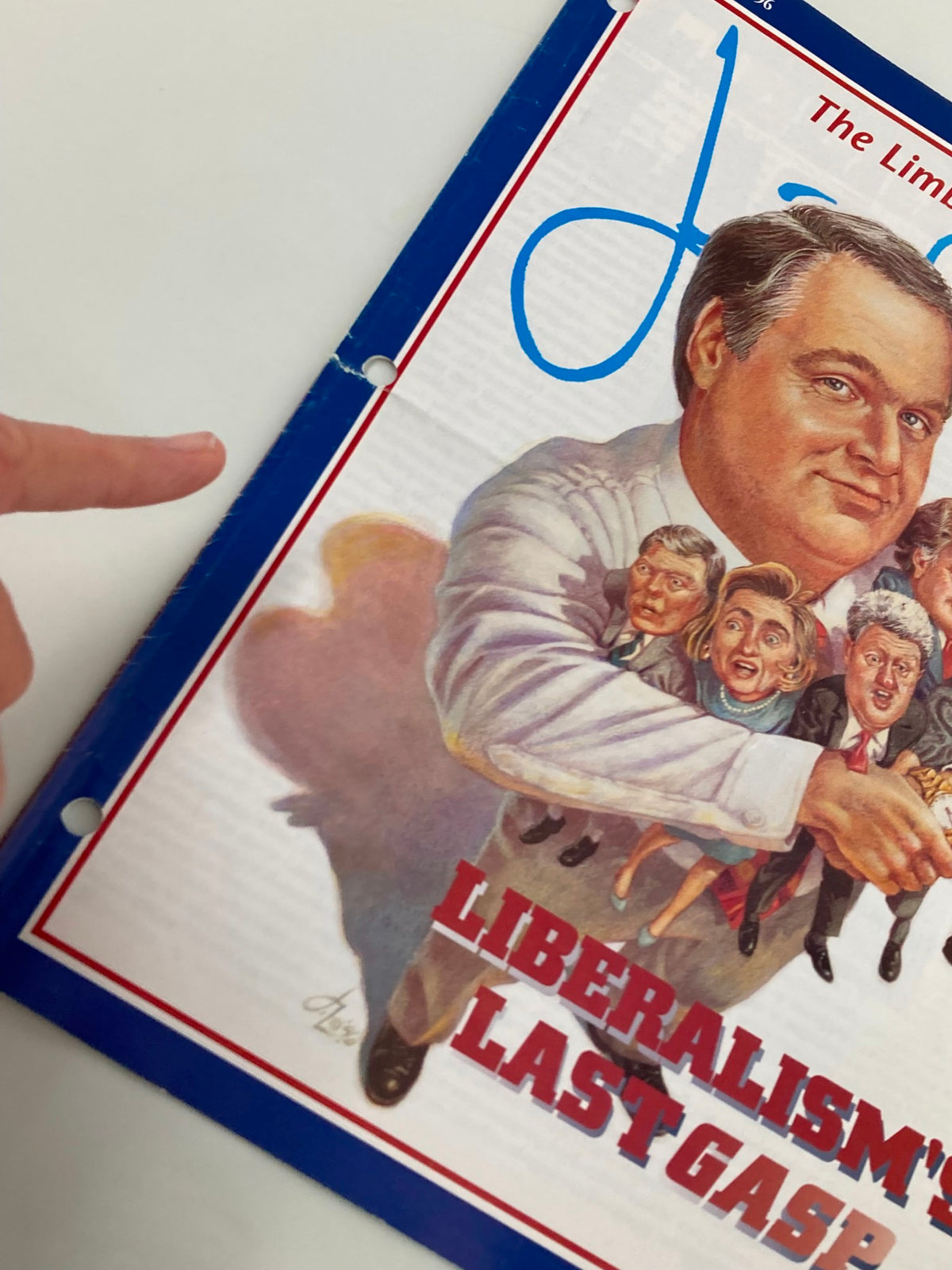 Side view of the Rush Limbaugh Letter Newsletter Magazine - November 1996, showing the title 'Liberalism's Last Gasp' and a hand pointing to the hole-punched edge.