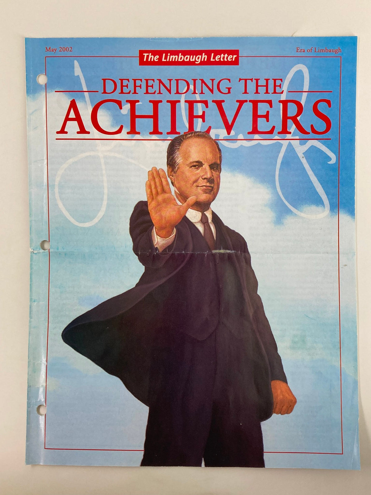 Cover of the Rush Limbaugh Letter Newsletter Magazine from May 2002 titled 'Defending the Achievers', featuring a figure with a raised hand against a blue background.