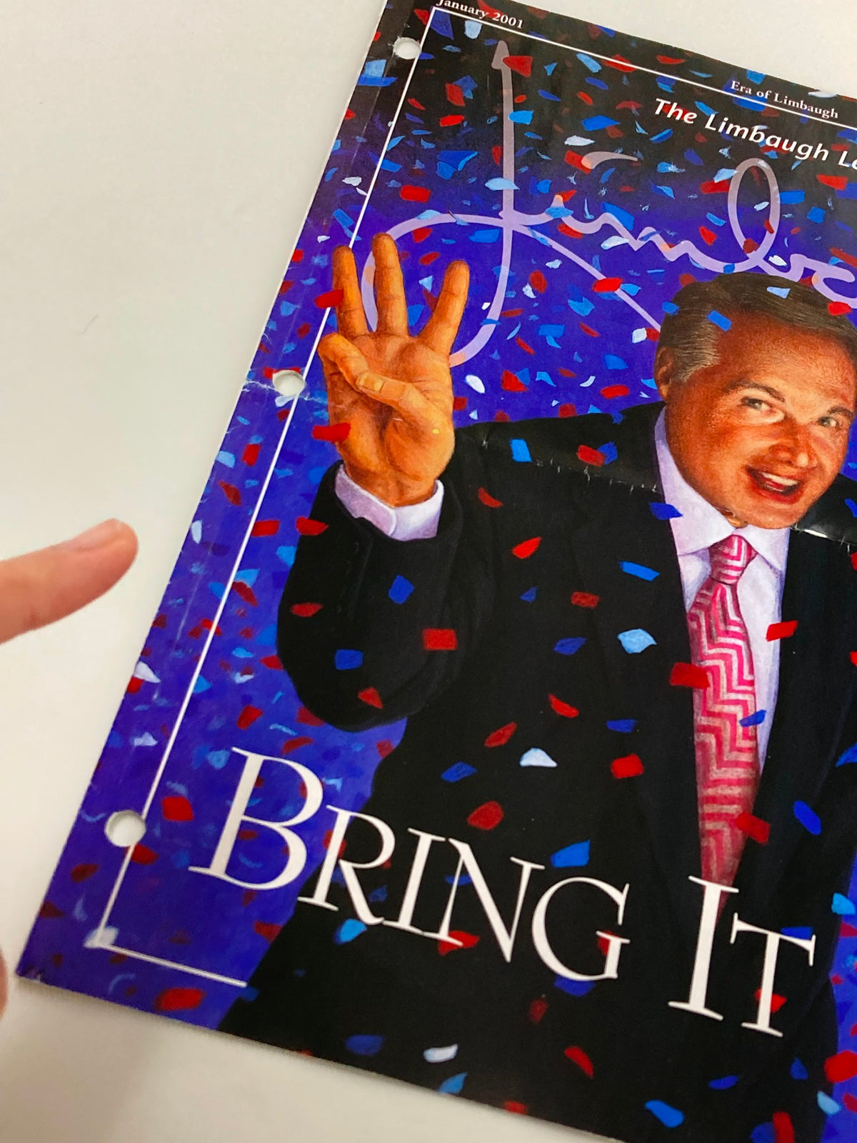 Close-up view of the Rush Limbaugh Letter Newsletter Magazine January 2001 cover showing Rush Limbaugh gesturing with his hands amidst colorful confetti, emphasizing the headline 'Bring It On'.