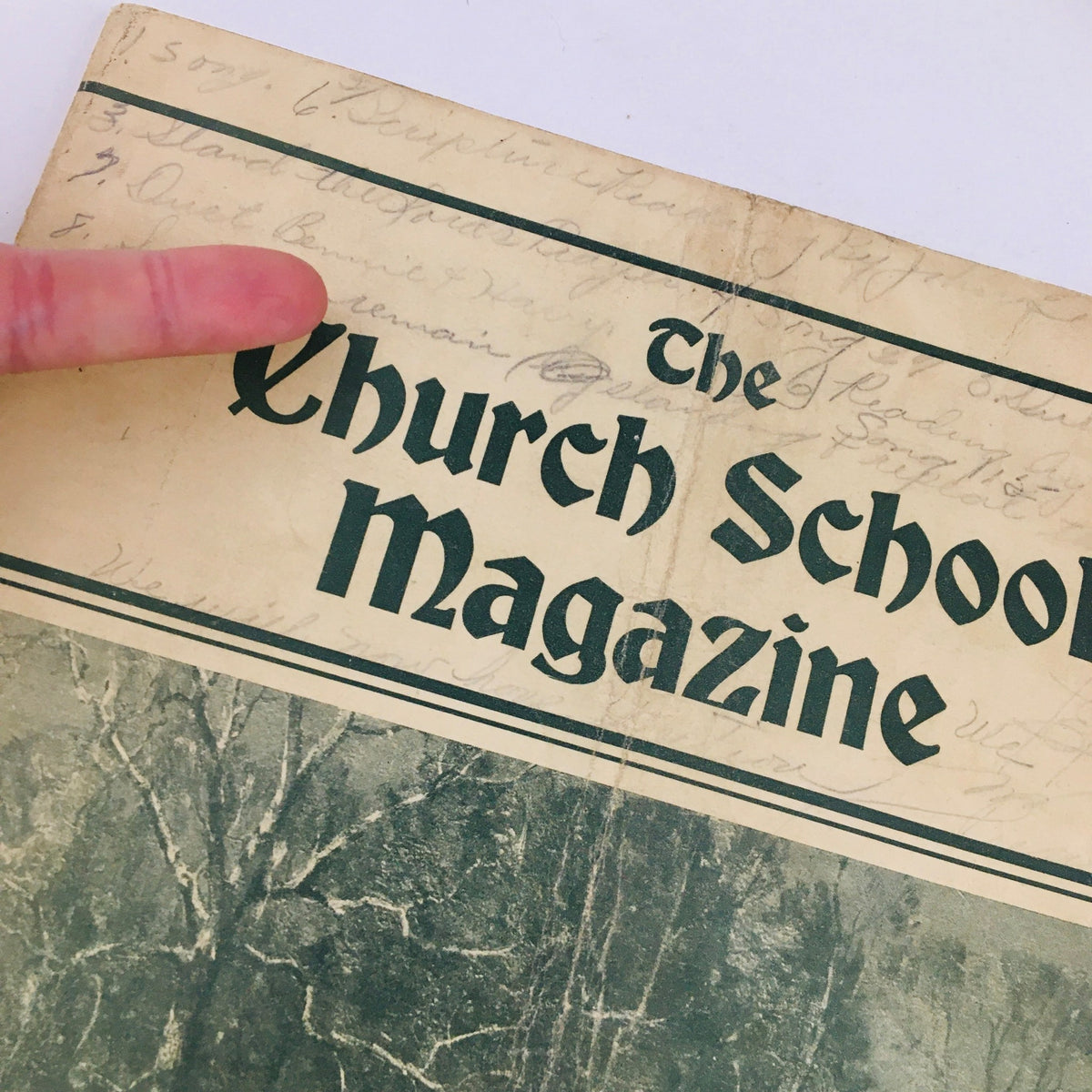 Close-up detail of The Church School Magazine March 1935 cover, highlighting the title and handwritten notes above it.