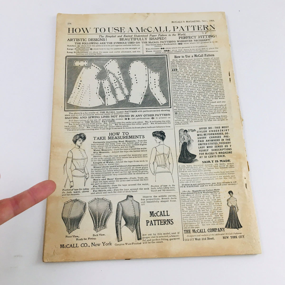 Back cover of VTG McCall's Magazine November 1904 with instructions on using McCall patterns, featuring diagrams of garment measurements and construction tips.