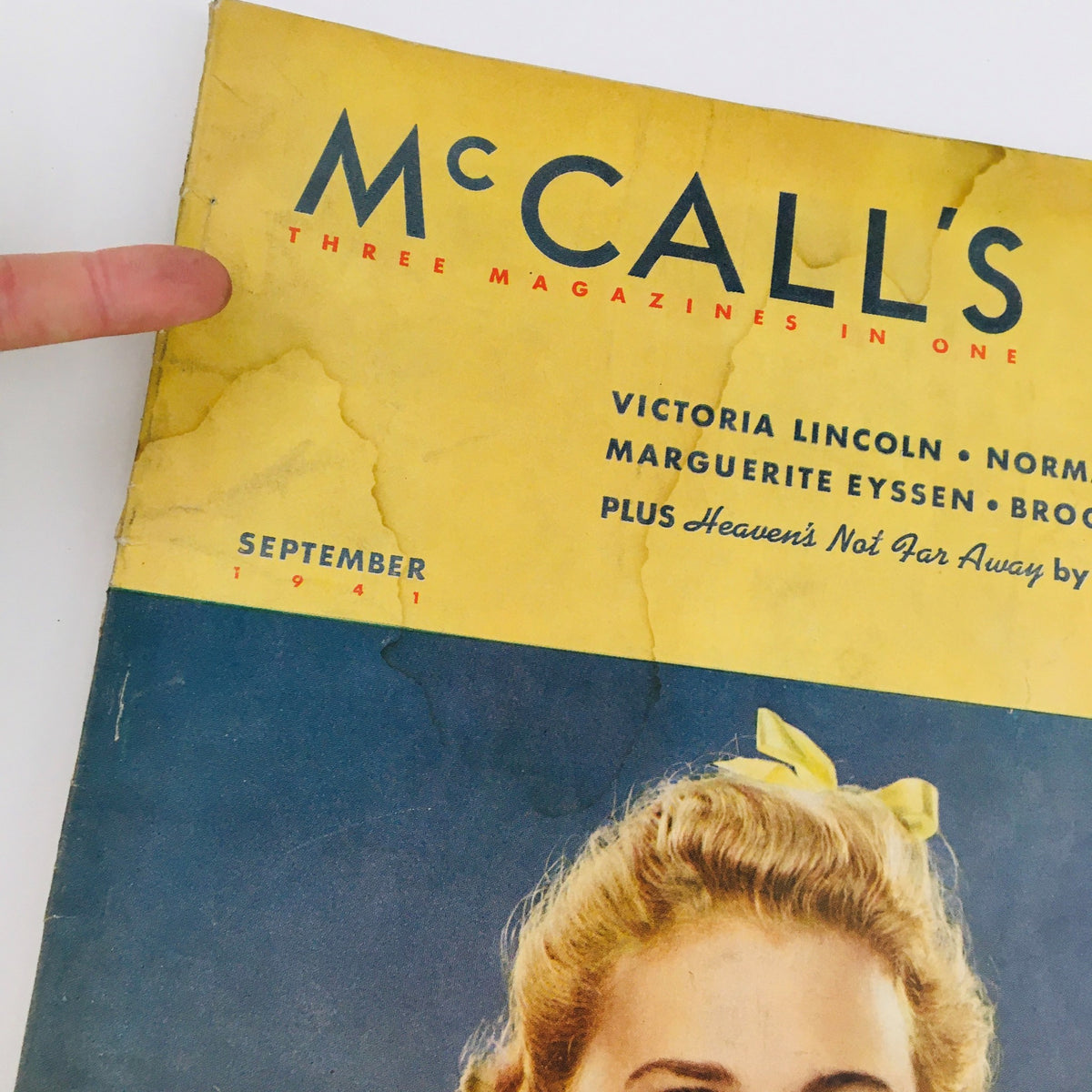 Cover of VTG McCall's Magazine September 1941 featuring the story Heaven's Not Far Away by Ursula Parrott, showcasing vintage design with a woman and bright colors.
