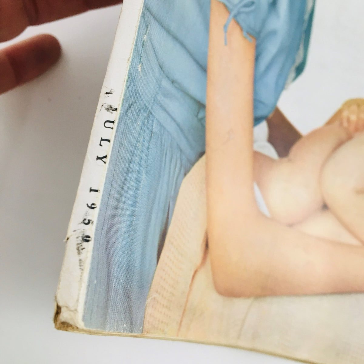Side view of the cover showing the spine and publication date July 1950 of VTG McCall's Magazine featuring Tana Hoban-Guillumette.