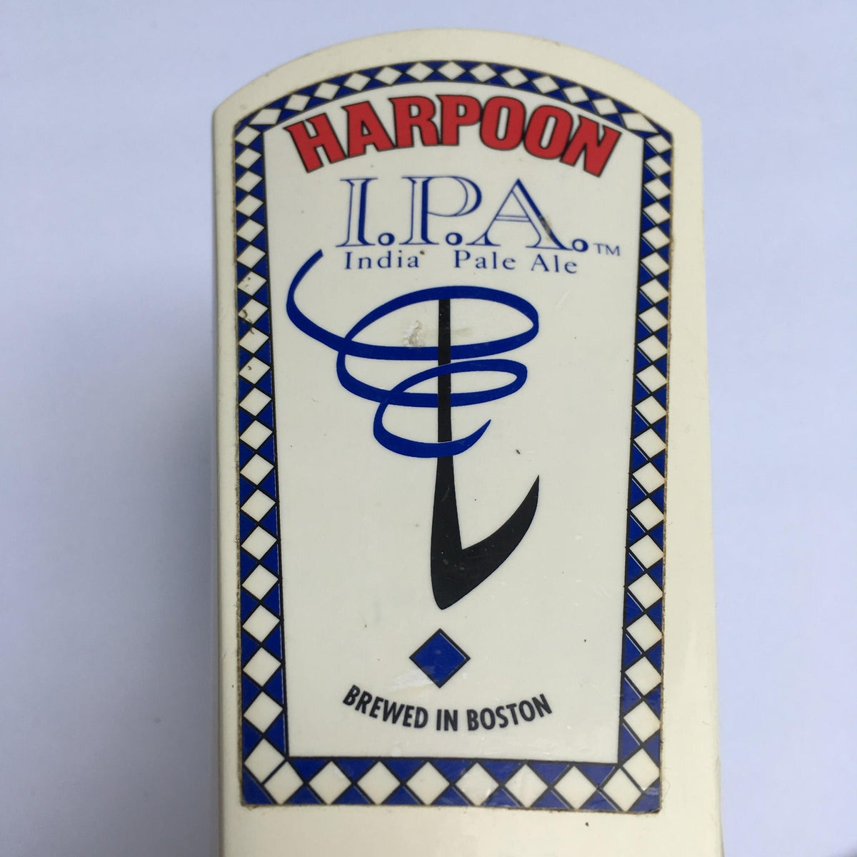 Detailed view of the logo on Vintage Harpoon IPA Indian Pale Ale 8½" Beer Tap Handle, featuring the brand name and brewing location.