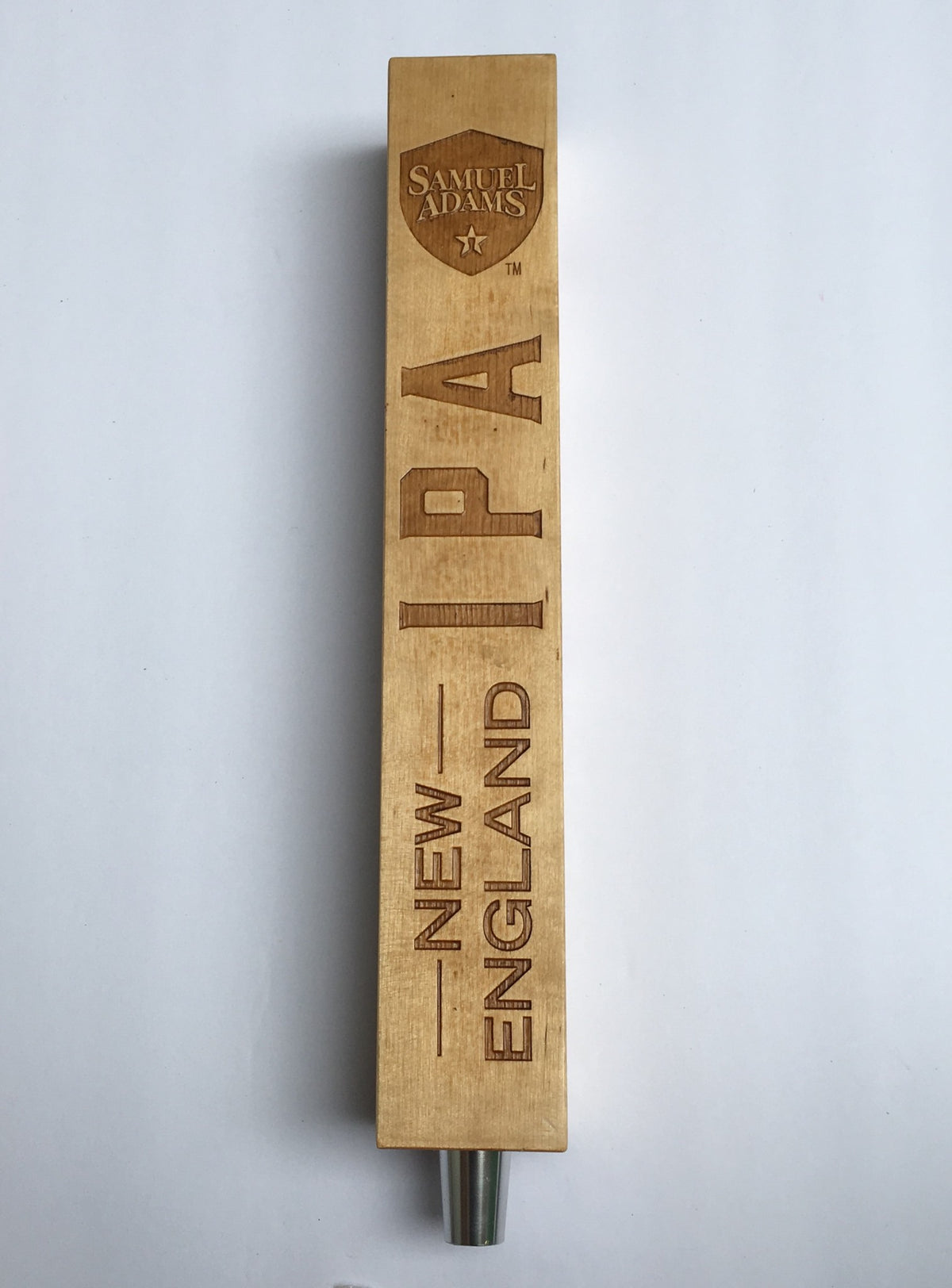 Side view of Vintage Samuel Adams New England IPA 13" Beer Tap Handle, emphasizing the engraved text and design details.