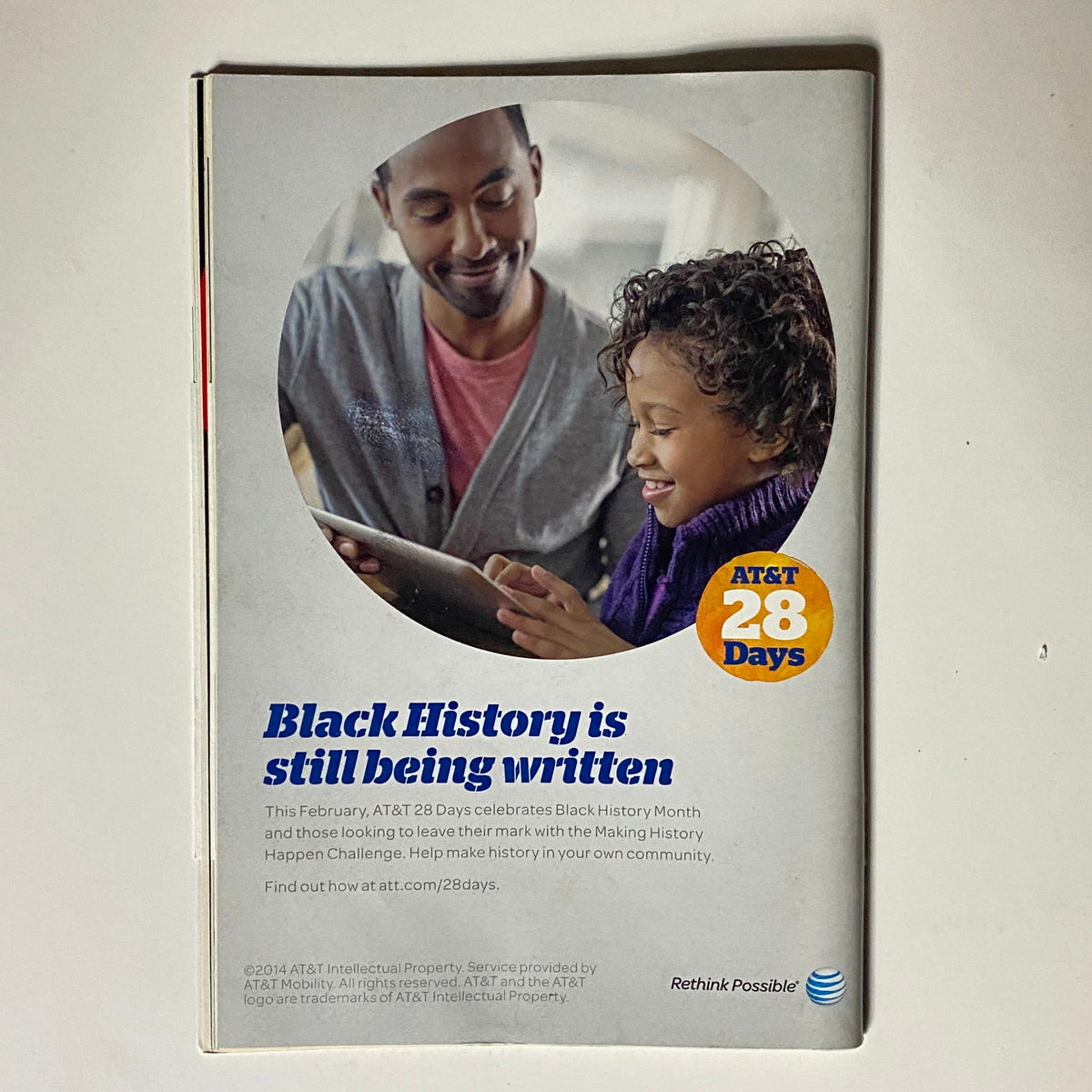 Back cover of Jet Magazine March 10, 2014 promoting AT&T's initiative for Black History Month featuring a father and child using a tablet.