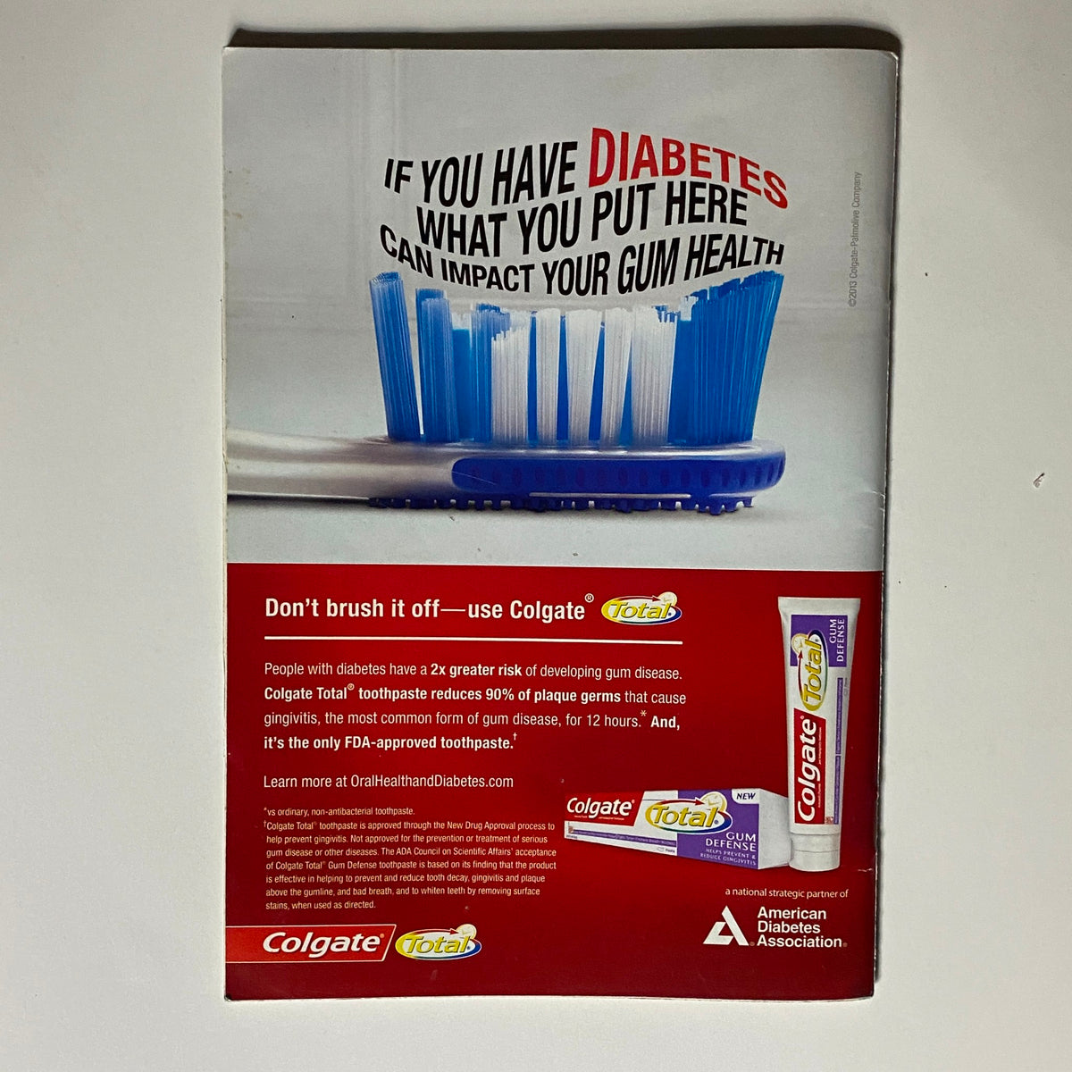 Back cover of Jet Magazine December 16, 2013, featuring an advertisement for Colgate Total, promoting oral health products that are essential for gum health.
