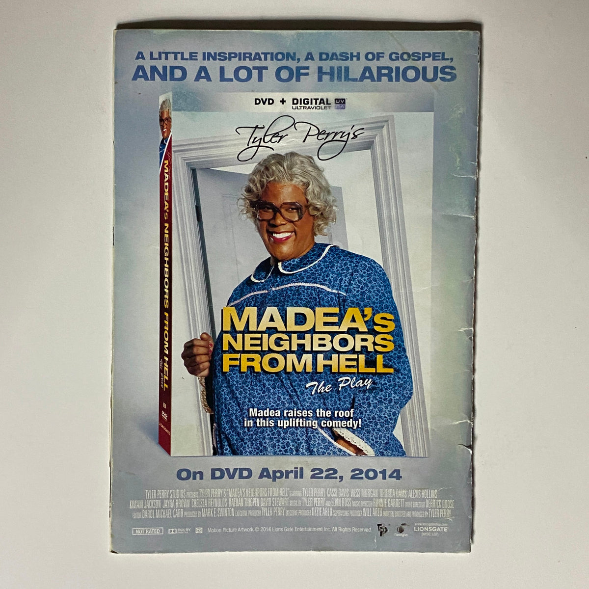 Back cover of Jet Magazine April 1, 2014 Vol 123 No. 6 promoting Tyler Perry's movie 'Madea's Neighbors from Hell', featuring comedic elements and DVD details.