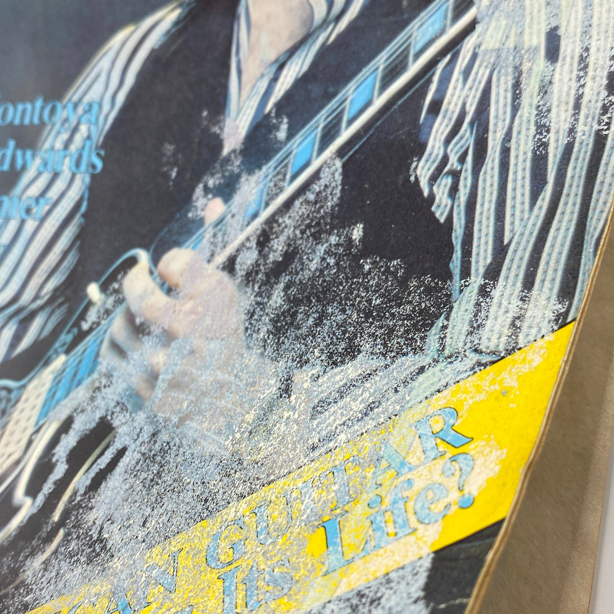 Close-up of the cover of Guitar Player Magazine February 1978 Vol 12 No 2, with details of Al DiMeola's cover story and vintage graphics.
