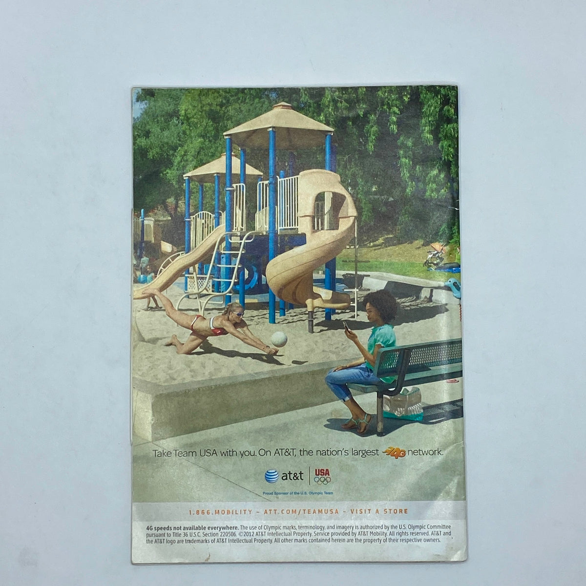 Back cover of Jet Magazine August 6, 2012 featuring a playground scene with children playing and a woman seated, promoting Team USA and AT&T's 4G network.