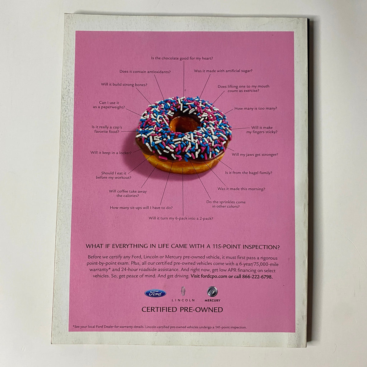 Muscle & Fitness Magazine September 2006 showcasing a colorful advertisement for a donut with sprinkles, illustrating a fun take on nutrition and lifestyle choices.