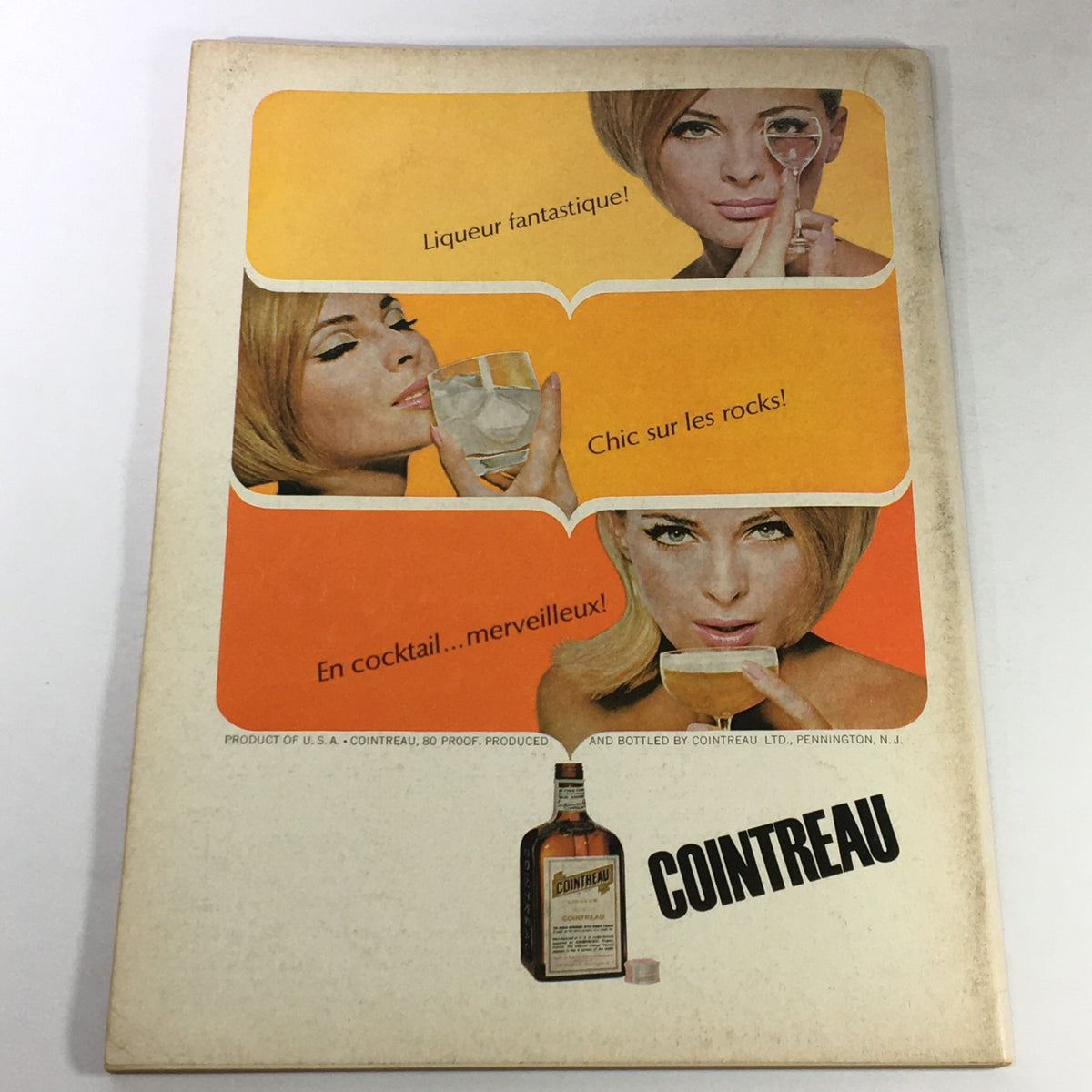 Back cover of VTG Gourmet The Magazine of Good Living October 1966 showcasing a vintage Cointreau advertisement with images of stylish women enjoying cocktails.