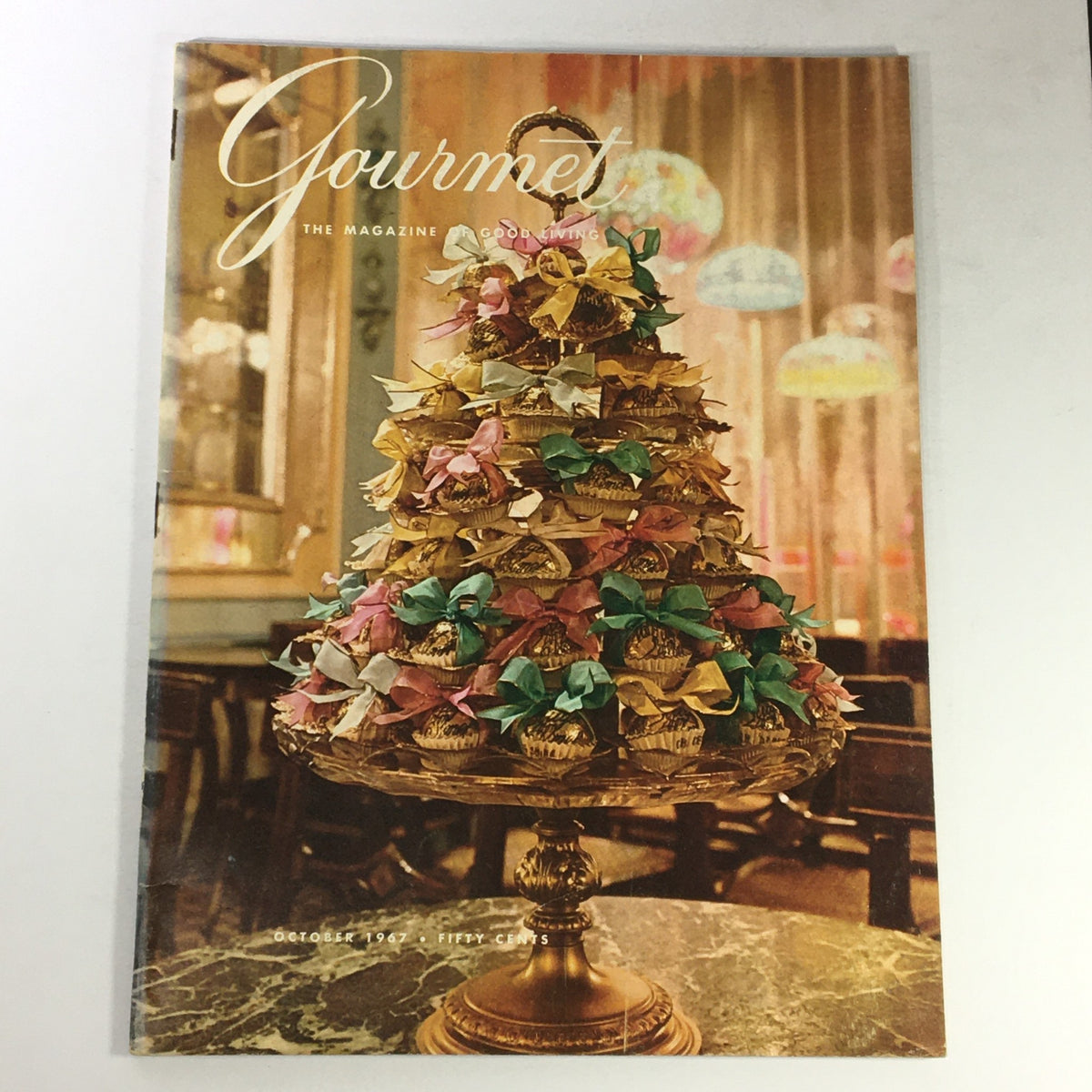 Cover of VTG Gourmet: The Magazine of Good Living October 1967 showcasing an elegant multi-tiered dessert display adorned with colorful ribbons.